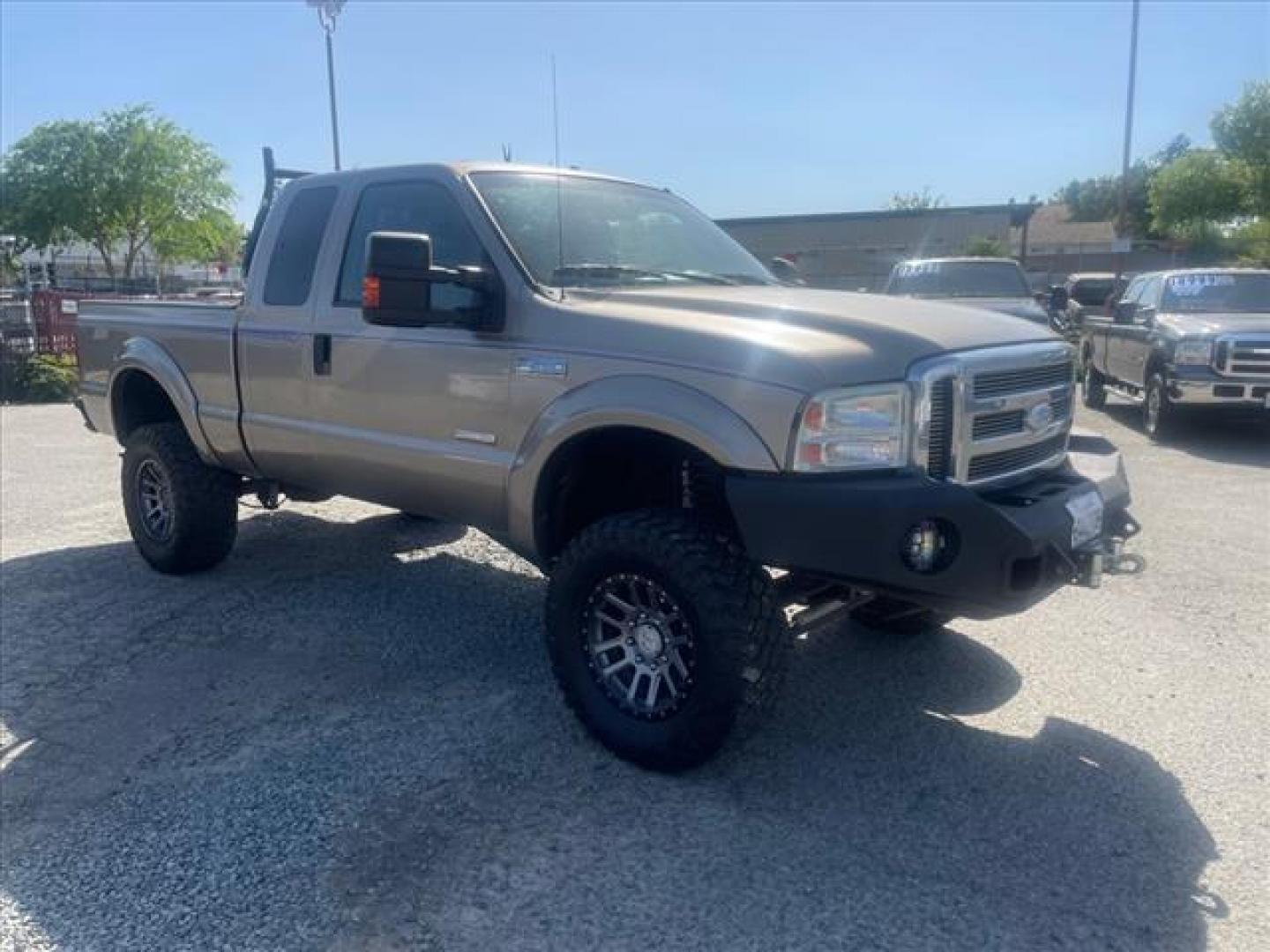 2006 Arizona Beige Clearcoat Metallic Ford F-250 Super Duty XLT (1FTSX21P76E) with an 6.0L Power Stroke 6.0L Diesel Turbo V8 325hp 560ft. lbs. Direct Injection engine, 5-Speed Automatic transmission, located at 800 Riverside Ave, Roseville, CA, 95678, (916) 773-4549, 38.732265, -121.291039 - DIESEL SUPER CAB 4X4 XLT LIFTED LOW MILES SERVICE RECORDS WINCH - Photo#1