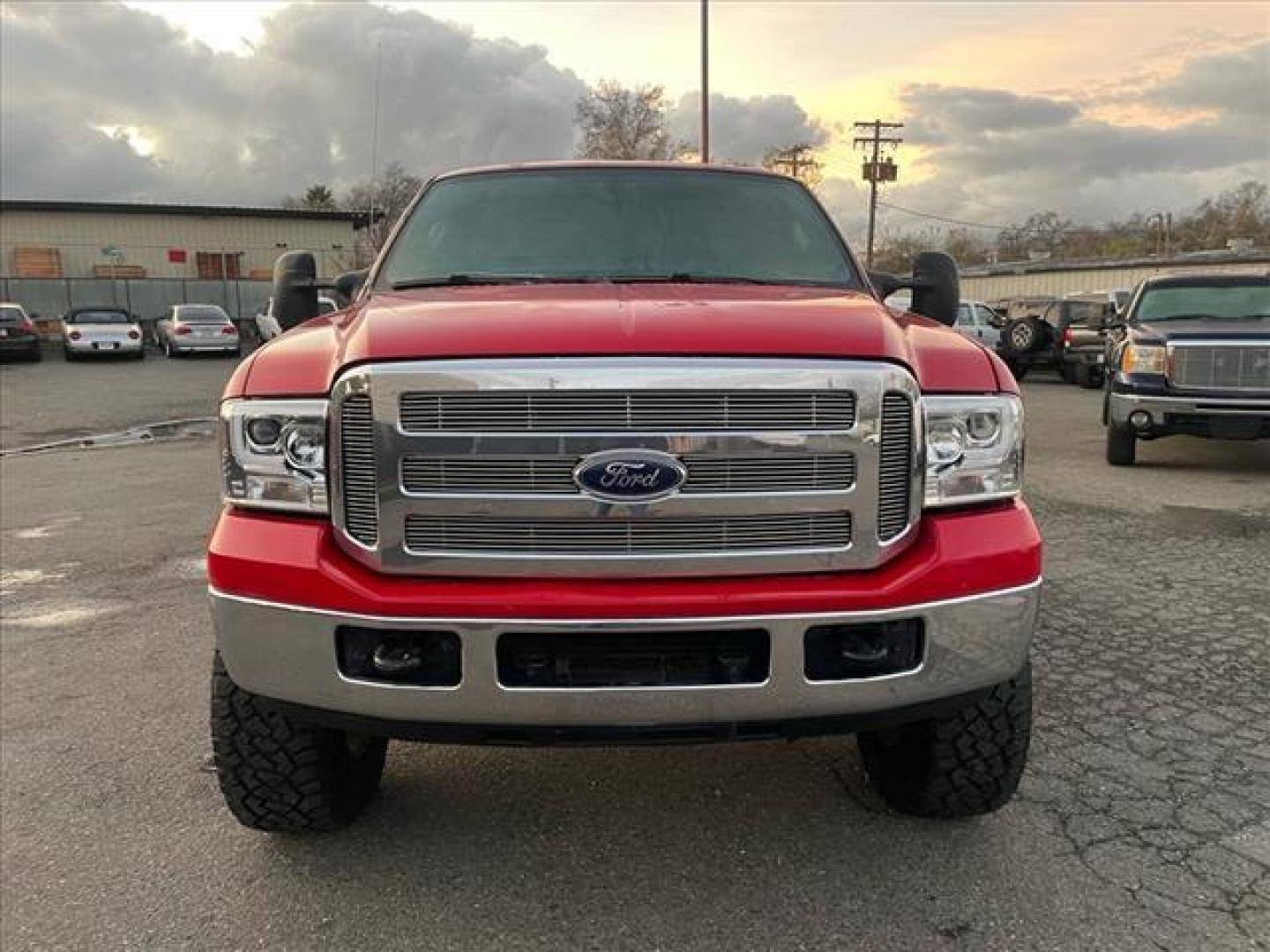 2005 Red Clearcoat Ford F-250 Super Duty Lariat (1FTSW21P05E) with an 6.0L Power Stroke 6.0L Diesel Turbo V8 325hp 560ft. lbs. Direct Injection engine, 5-Speed Automatic transmission, located at 800 Riverside Ave, Roseville, CA, 95678, (916) 773-4549, 38.732265, -121.291039 - DIESEL CREW CAB 4X4 BULLET PROOF EGR COOLER HEADSTUDS NEW TIRES LIFTED - Photo#7