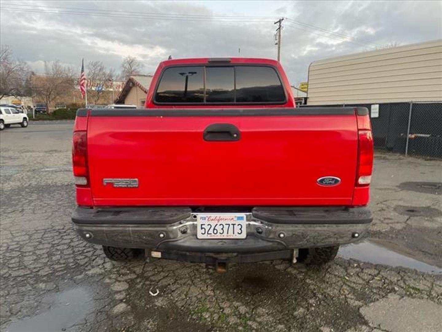 2005 Red Clearcoat Ford F-250 Super Duty Lariat (1FTSW21P05E) with an 6.0L Power Stroke 6.0L Diesel Turbo V8 325hp 560ft. lbs. Direct Injection engine, 5-Speed Automatic transmission, located at 800 Riverside Ave, Roseville, CA, 95678, (916) 773-4549, 38.732265, -121.291039 - DIESEL CREW CAB 4X4 BULLET PROOF EGR COOLER HEADSTUDS NEW TIRES LIFTED - Photo#8