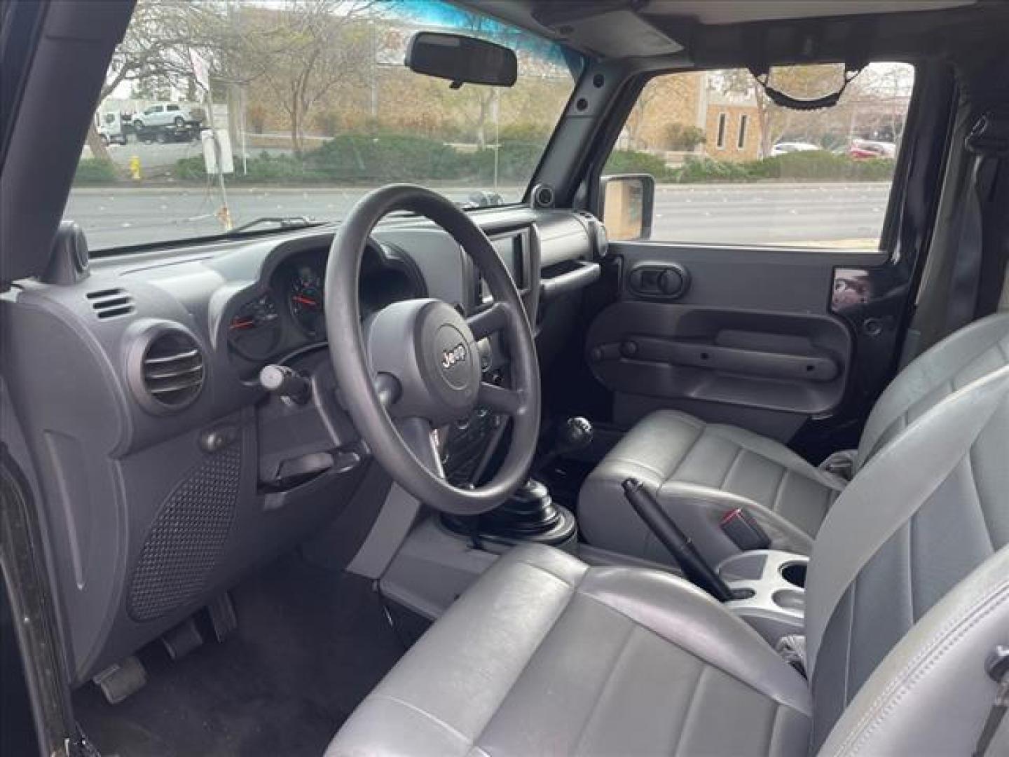 2009 Black Clear Coat Jeep Wrangler X (1J4FA24149L) with an 3.8L 3.8L V6 202hp 237ft. lbs. Sequential Multiport Fuel Injection engine, 6-Speed Manual transmission, located at 800 Riverside Ave, Roseville, CA, 95678, (916) 773-4549, 38.732265, -121.291039 - 4X4 LOW MILES 6 SPEED MANUAL NEW TIRES CLEAN CARFAX - Photo#10