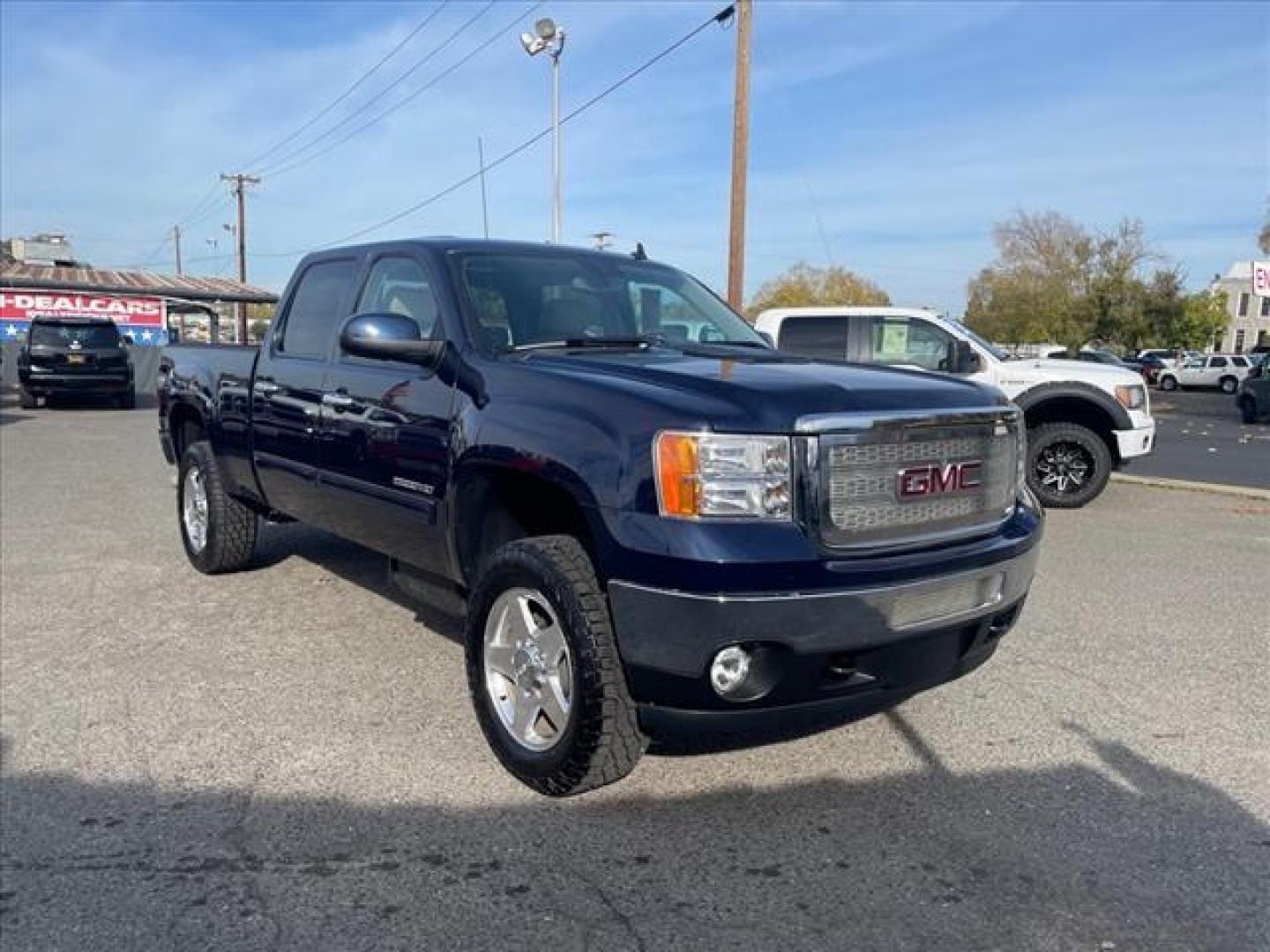 2012 Midnight Blue Metallic GMC Sierra 2500HD SLT (1GT121E87CF) with an 6.6L Duramax 6.6L Diesel Turbo V8 397hp 765ft. lbs. Common Rail Direct Injection engine, Allison 1000 6-Speed Shiftable Automatic transmission, located at 800 Riverside Ave, Roseville, CA, 95678, (916) 773-4549, 38.732265, -121.291039 - Photo#1