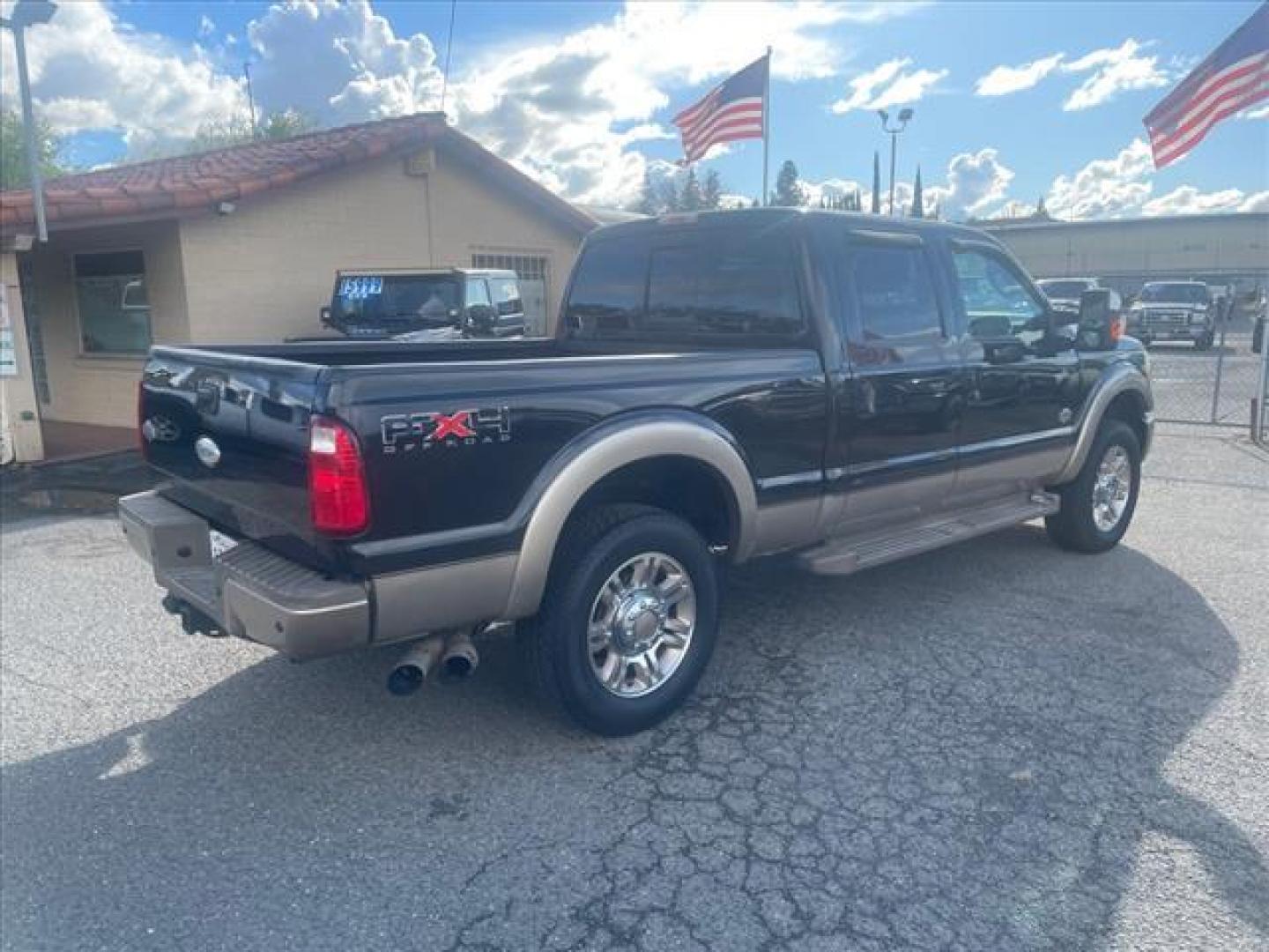 2011 Black/Pale Adobe Metallic Ford F-250 Super Duty King Ranch (1FT7W2BT7BE) with an 6.7L Power Stroke 6.7L Biodiesel Turbo V8 400hp 800ft. lbs. Common Rail Direct Injection engine, 6-Speed Shiftable Automatic transmission, located at 800 Riverside Ave, Roseville, CA, 95678, (916) 773-4549, 38.732265, -121.291039 - DIESEL CREW CAB 4X4 FX4 KING RANCH FULLY LOADED SERVICE RECORDS ON CLEAN CARFAX - Photo#4