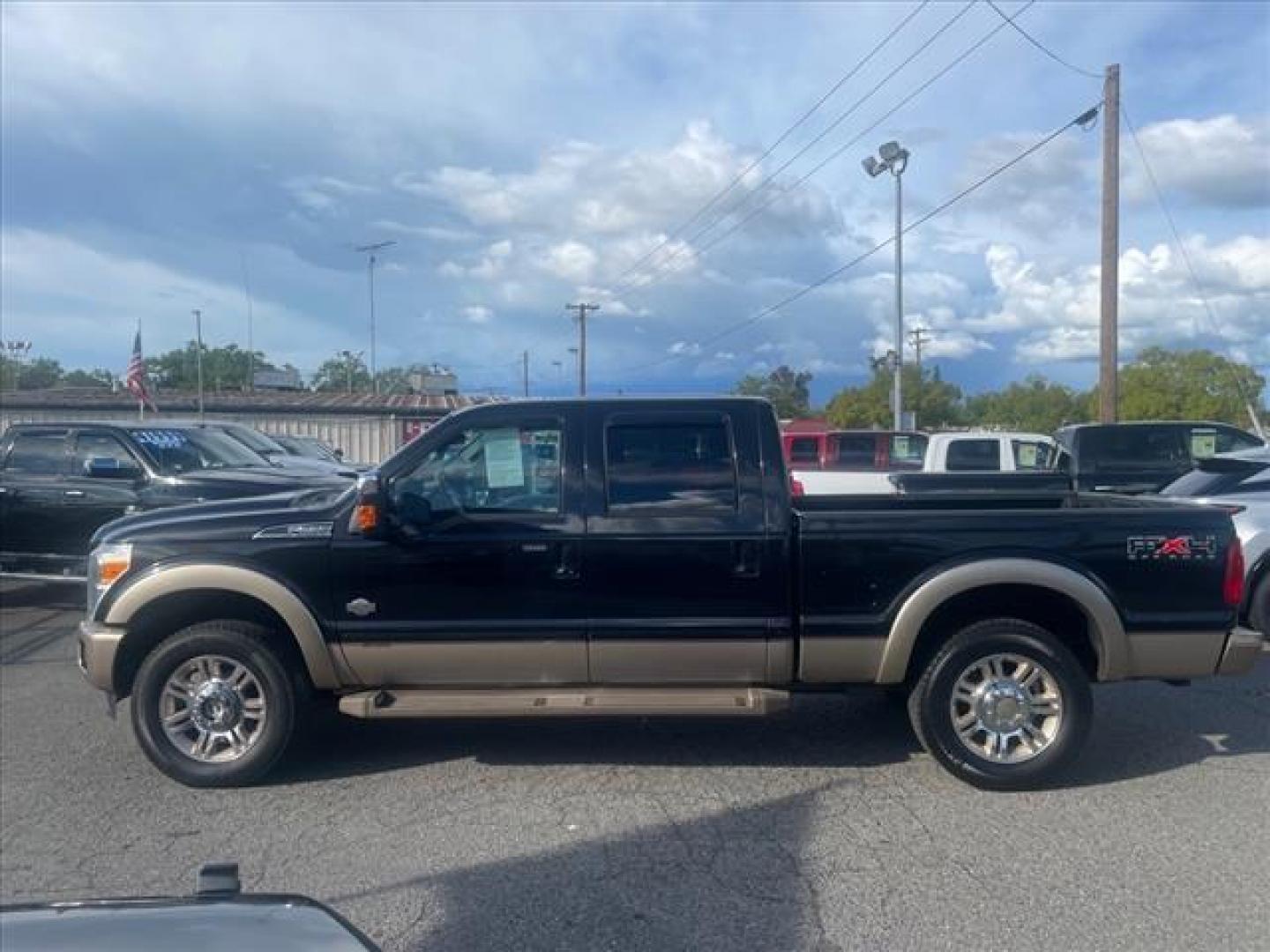 2011 Black/Pale Adobe Metallic Ford F-250 Super Duty King Ranch (1FT7W2BT7BE) with an 6.7L Power Stroke 6.7L Biodiesel Turbo V8 400hp 800ft. lbs. Common Rail Direct Injection engine, 6-Speed Shiftable Automatic transmission, located at 800 Riverside Ave, Roseville, CA, 95678, (916) 773-4549, 38.732265, -121.291039 - DIESEL CREW CAB 4X4 FX4 KING RANCH FULLY LOADED SERVICE RECORDS ON CLEAN CARFAX - Photo#5