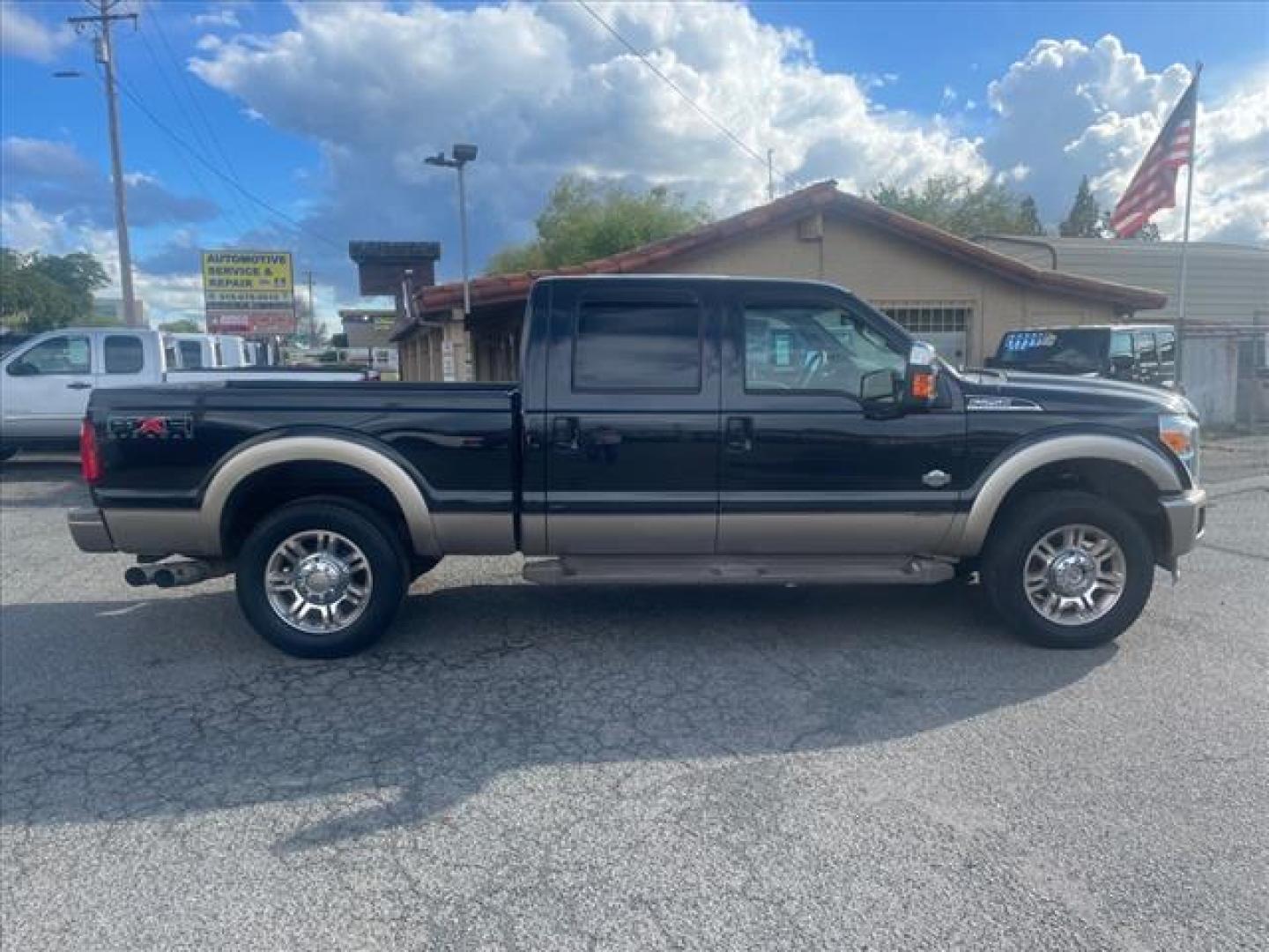 2011 Black/Pale Adobe Metallic Ford F-250 Super Duty King Ranch (1FT7W2BT7BE) with an 6.7L Power Stroke 6.7L Biodiesel Turbo V8 400hp 800ft. lbs. Common Rail Direct Injection engine, 6-Speed Shiftable Automatic transmission, located at 800 Riverside Ave, Roseville, CA, 95678, (916) 773-4549, 38.732265, -121.291039 - DIESEL CREW CAB 4X4 FX4 KING RANCH FULLY LOADED SERVICE RECORDS ON CLEAN CARFAX - Photo#6