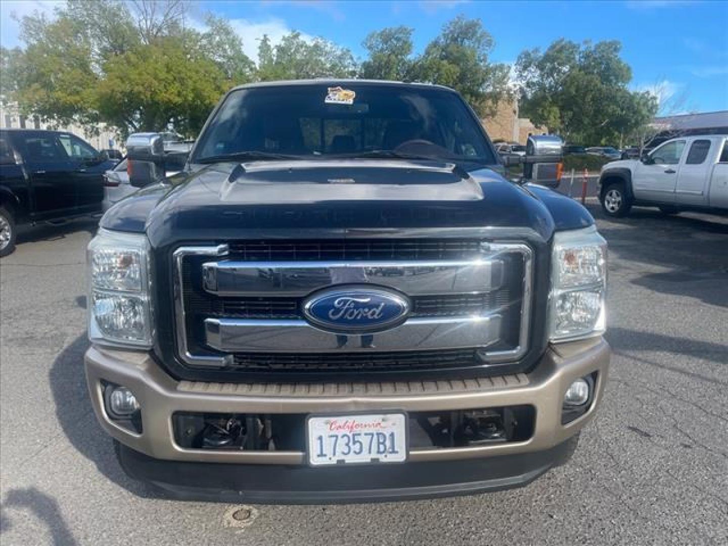 2011 Black/Pale Adobe Metallic Ford F-250 Super Duty King Ranch (1FT7W2BT7BE) with an 6.7L Power Stroke 6.7L Biodiesel Turbo V8 400hp 800ft. lbs. Common Rail Direct Injection engine, 6-Speed Shiftable Automatic transmission, located at 800 Riverside Ave, Roseville, CA, 95678, (916) 773-4549, 38.732265, -121.291039 - DIESEL CREW CAB 4X4 FX4 KING RANCH FULLY LOADED SERVICE RECORDS ON CLEAN CARFAX - Photo#8