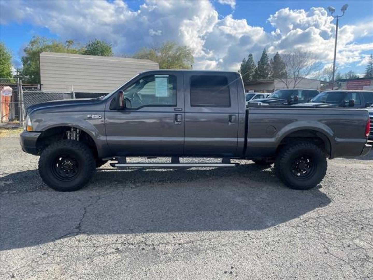 2004 Dark Shadow Grey Clearcoat Metallic Ford F-250 Super Duty XLT (1FTNW21P94E) with an Power Stroke 6.0L Diesel Turbo V8 325hp 560ft. lbs. Other engine, 5-Speed Automatic transmission, located at 800 Riverside Ave, Roseville, CA, 95678, (916) 773-4549, 38.732265, -121.291039 - Photo#4