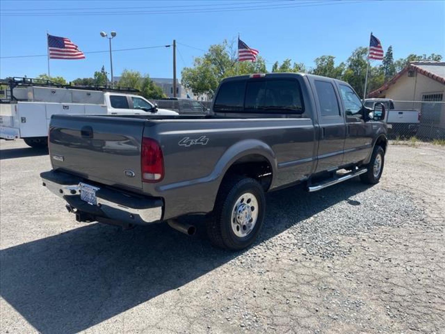 2005 Dark Shadow Grey Clearcoat Metallic Ford F-250 Super Duty XLT (1FTSW21P05E) with an 6.0L Power Stroke 6.0L Diesel Turbo V8 325hp 560ft. lbs. Direct Injection engine, 5-Speed Automatic transmission, located at 800 Riverside Ave, Roseville, CA, 95678, (916) 773-4549, 38.732265, -121.291039 - DIESEL CREW CAB 4X4 XLT LOW MILES NEW EGR AND OIL COOLER ONE OWNER CLEAN CARFAX - Photo#3