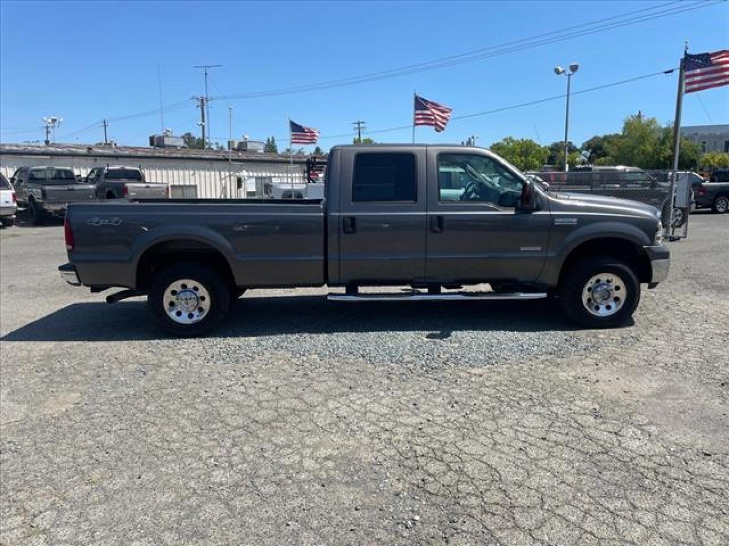 2005 Dark Shadow Grey Clearcoat Metallic Ford F-250 Super Duty XLT (1FTSW21P05E) with an 6.0L Power Stroke 6.0L Diesel Turbo V8 325hp 560ft. lbs. Direct Injection engine, 5-Speed Automatic transmission, located at 800 Riverside Ave, Roseville, CA, 95678, (916) 773-4549, 38.732265, -121.291039 - DIESEL CREW CAB 4X4 XLT LOW MILES NEW EGR AND OIL COOLER ONE OWNER CLEAN CARFAX - Photo#5