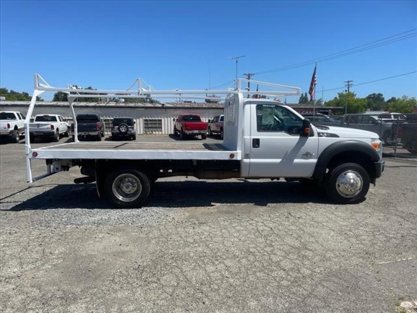 2015 Oxford White Ford F-450 Super Duty XL (1FDUF4GT9FE) with an 6.7L Power Stroke 6.7L Biodiesel Turbo V8 440hp 860ft. lbs. Common Rail Direct Injection engine, 6-Speed Shiftable Automatic transmission, located at 800 Riverside Ave, Roseville, CA, 95678, (916) 773-4549, 38.732265, -121.291039 - DIESEL FLATBED DUALLY ONE OWNER SERVICE RECORDS ON CLEAN CARFAX - Photo#4