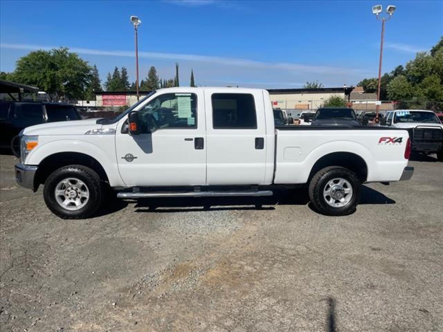 2015 Oxford White Ford F-250 Super Duty XLT (1FT7W2BT1FE) with an 6.7L Power Stroke 6.7L Biodiesel Turbo V8 440hp 860ft. lbs. Common Rail Direct Injection engine, 6-Speed Shiftable Automatic transmission, located at 800 Riverside Ave, Roseville, CA, 95678, (916) 773-4549, 38.732265, -121.291039 - Photo#4