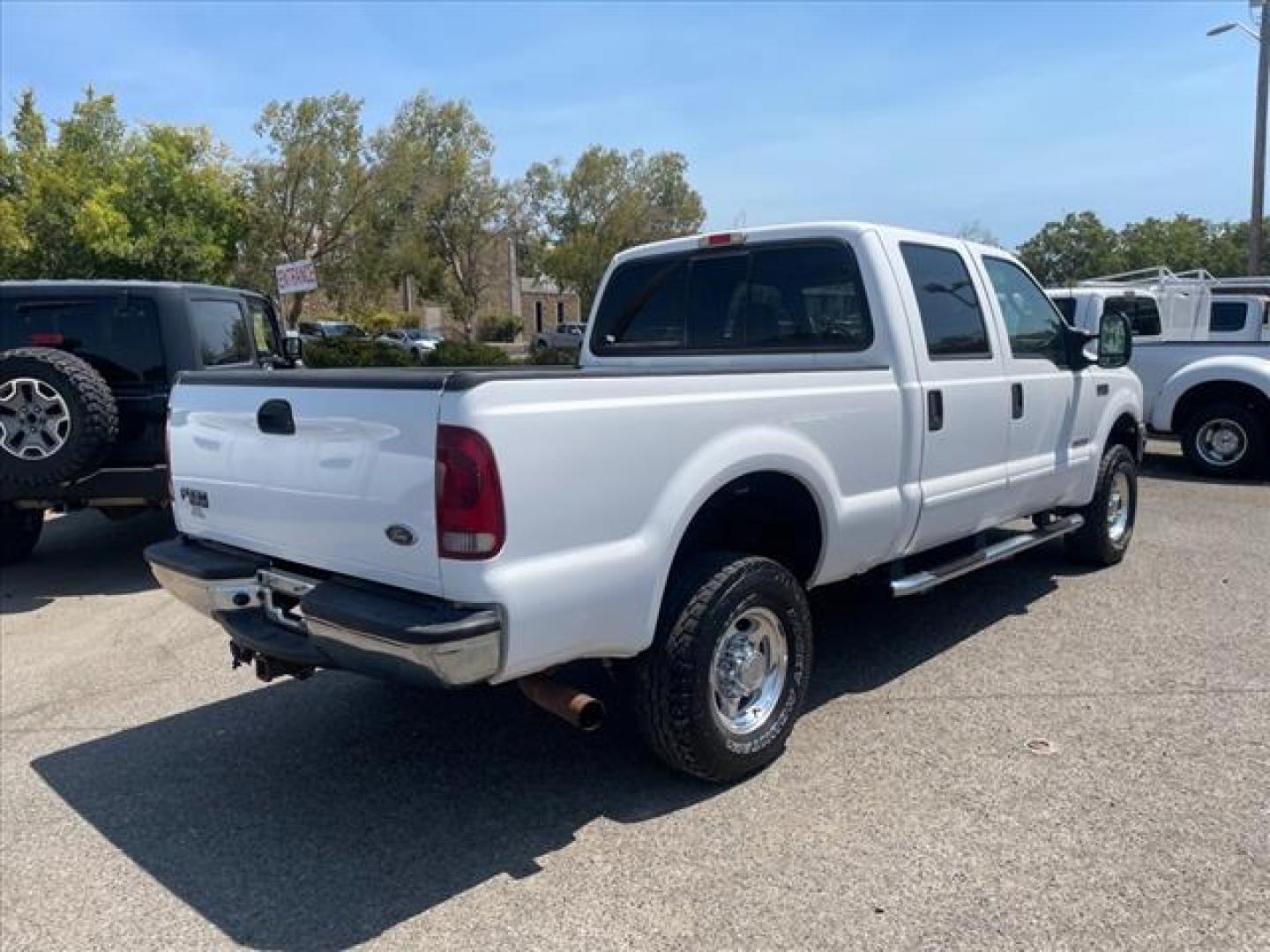 2003 Oxford White Metallic Ford F-350 Super Duty Lariat (1FTSW31PX3E) with an Power Stroke 6.0L Diesel Turbo V8 325hp 560ft. lbs. Other engine, 5-Speed Automatic transmission, located at 800 Riverside Ave, Roseville, CA, 95678, (916) 773-4549, 38.732265, -121.291039 - DIESEL CREW CAB 4X4 LARIAT 112K MILES MOON ROOF ONE OWNER CLEAN CARFAX - Photo#3