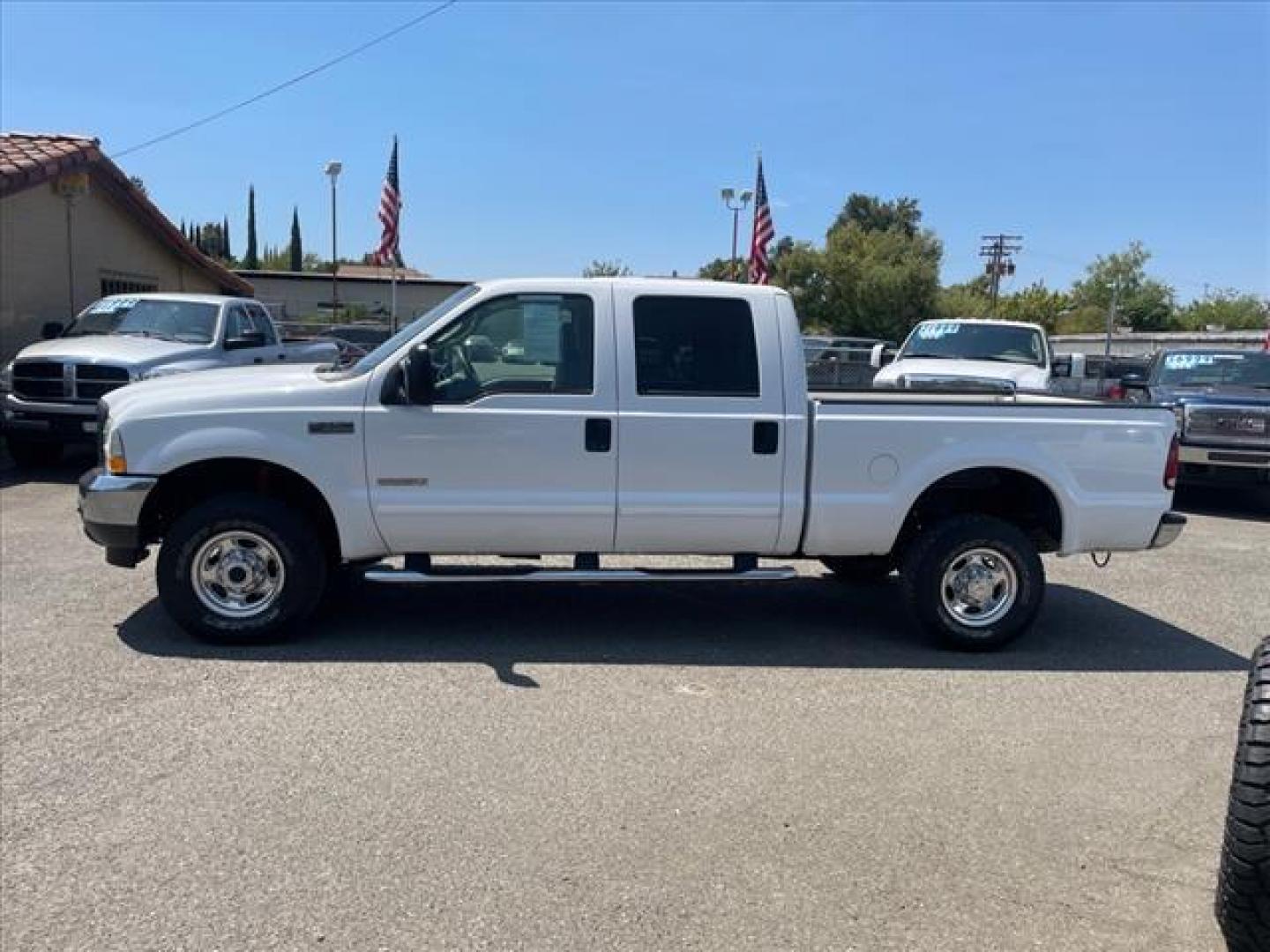 2003 Oxford White Metallic Ford F-350 Super Duty Lariat (1FTSW31PX3E) with an Power Stroke 6.0L Diesel Turbo V8 325hp 560ft. lbs. Other engine, 5-Speed Automatic transmission, located at 800 Riverside Ave, Roseville, CA, 95678, (916) 773-4549, 38.732265, -121.291039 - DIESEL CREW CAB 4X4 LARIAT 112K MILES MOON ROOF ONE OWNER CLEAN CARFAX - Photo#4