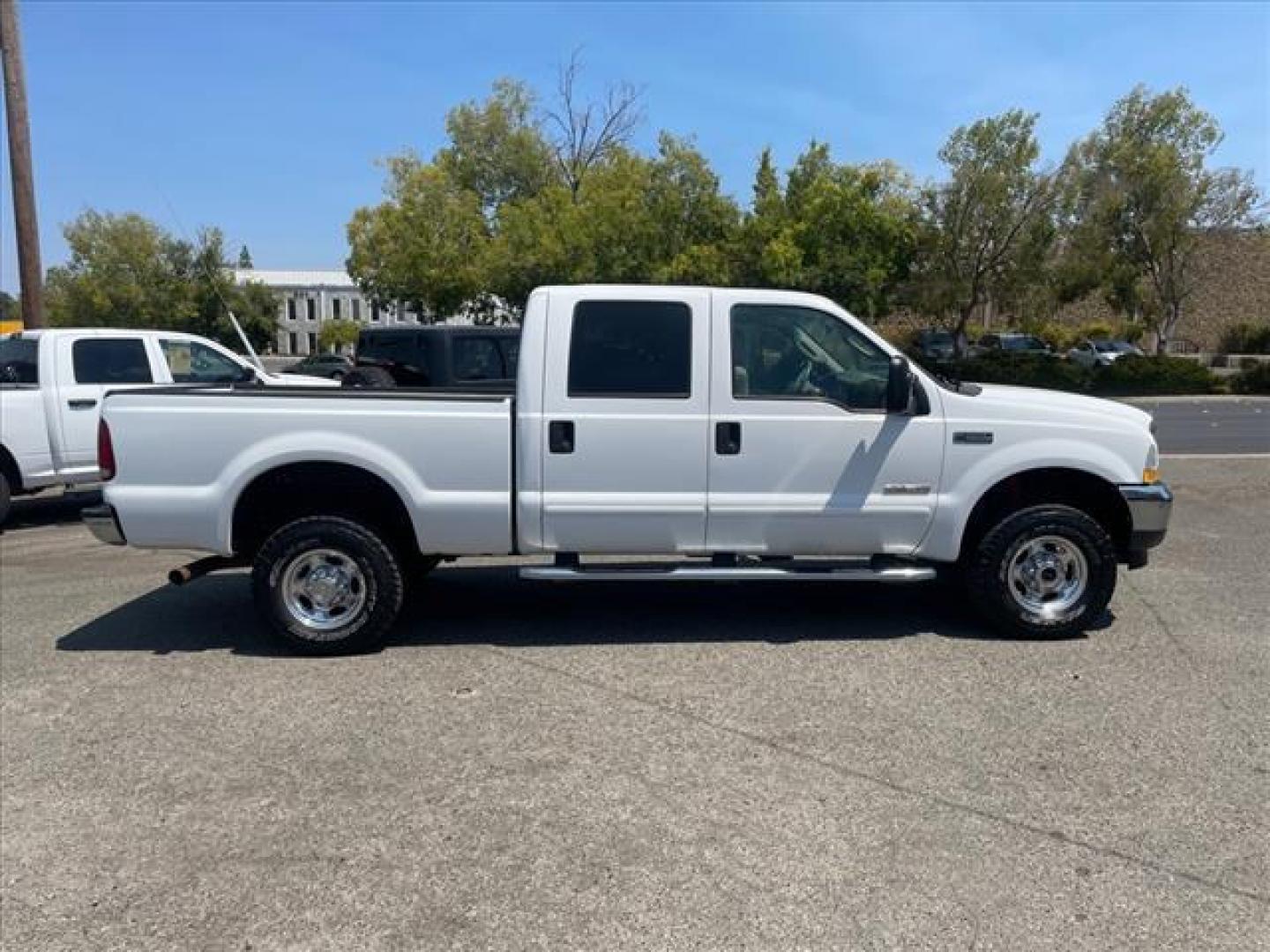 2003 Oxford White Metallic Ford F-350 Super Duty Lariat (1FTSW31PX3E) with an Power Stroke 6.0L Diesel Turbo V8 325hp 560ft. lbs. Other engine, 5-Speed Automatic transmission, located at 800 Riverside Ave, Roseville, CA, 95678, (916) 773-4549, 38.732265, -121.291039 - DIESEL CREW CAB 4X4 LARIAT 112K MILES MOON ROOF ONE OWNER CLEAN CARFAX - Photo#5