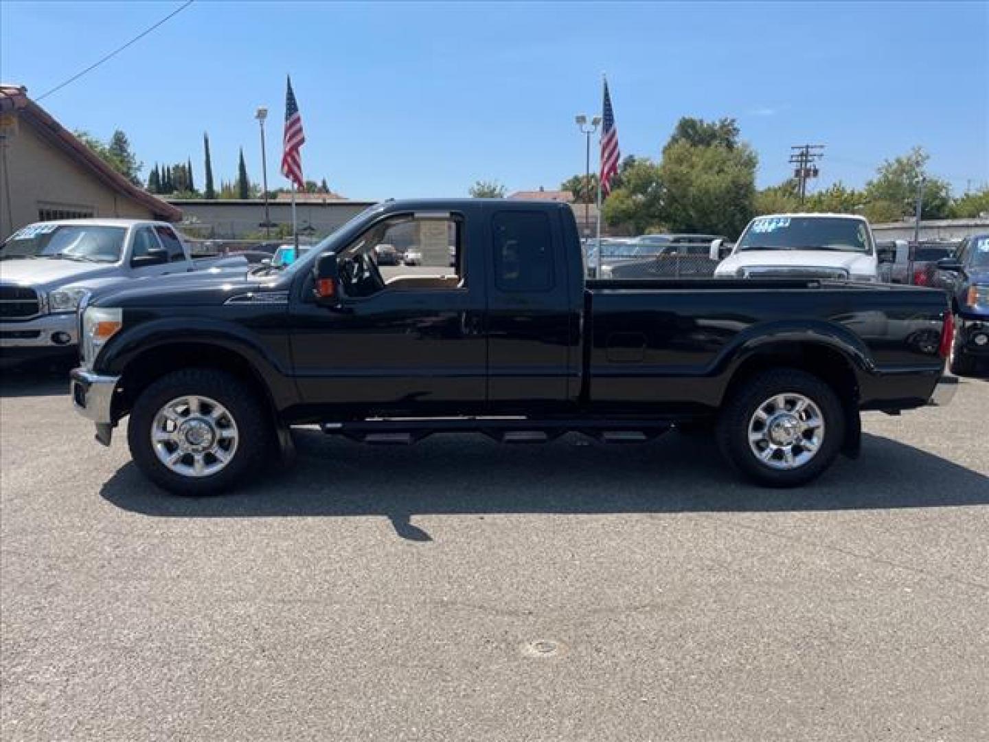 2015 Tuxedo Black Metallic Ford F-250 Super Duty Lariat (1FT7X2B61FE) with an 6.2L 6.2L Flex Fuel V8 385hp 405ft. lbs. Sequential Electronic Fuel Injection engine, 6-Speed Shiftable Automatic transmission, located at 800 Riverside Ave, Roseville, CA, 95678, (916) 773-4549, 38.732265, -121.291039 - Photo#4