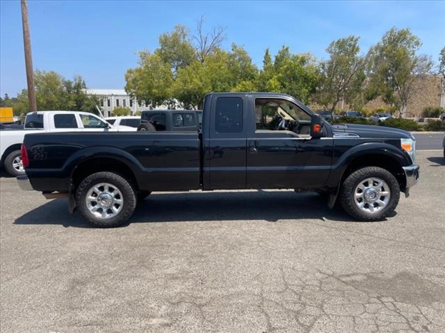 2015 Tuxedo Black Metallic Ford F-250 Super Duty Lariat (1FT7X2B61FE) with an 6.2L 6.2L Flex Fuel V8 385hp 405ft. lbs. Sequential Electronic Fuel Injection engine, 6-Speed Shiftable Automatic transmission, located at 800 Riverside Ave, Roseville, CA, 95678, (916) 773-4549, 38.732265, -121.291039 - Photo#5