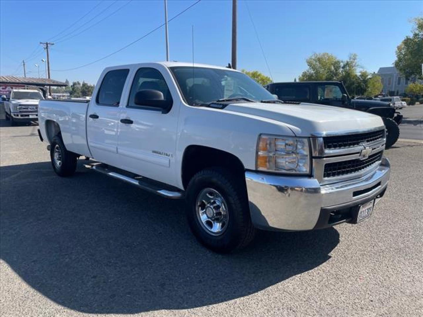 2007 Summit White Chevrolet Silverado 2500HD LT1 (1GCHC23617F) with an 6.6L Duramax 6.6L V8 Turbo 365hp 660ft. lbs. Direct Injection engine, Allison 1000 6-Speed Shiftable Automatic transmission, located at 800 Riverside Ave, Roseville, CA, 95678, (916) 773-4549, 38.732265, -121.291039 - DURAMAX DIESEL CREW CAB LT ALLISON TRANSMISSION SERVICE RECORDS ON CLEAN CARFAX - Photo#1