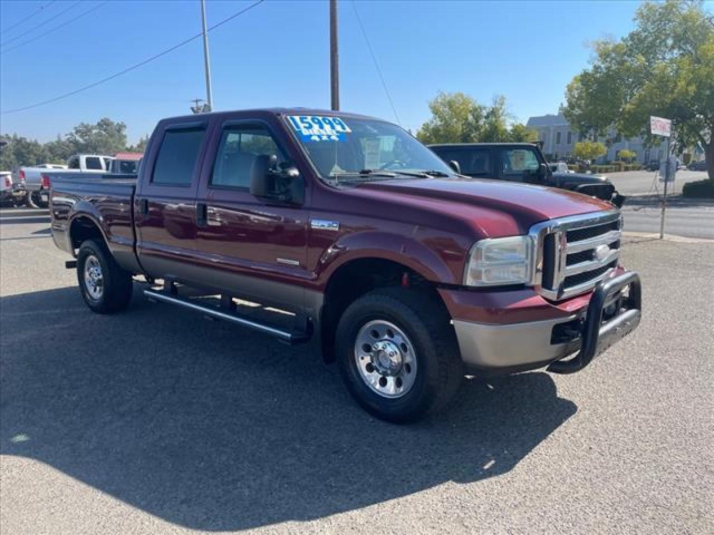 2005 Dark Toreador Red Clearcoat Ford F-250 Super Duty XLT (1FTSW21P05E) with an 6.0L Power Stroke 6.0L Diesel Turbo V8 325hp 560ft. lbs. Direct Injection engine, 6-Speed Manual transmission, located at 800 Riverside Ave, Roseville, CA, 95678, (916) 773-4549, 38.732265, -121.291039 - Photo#1