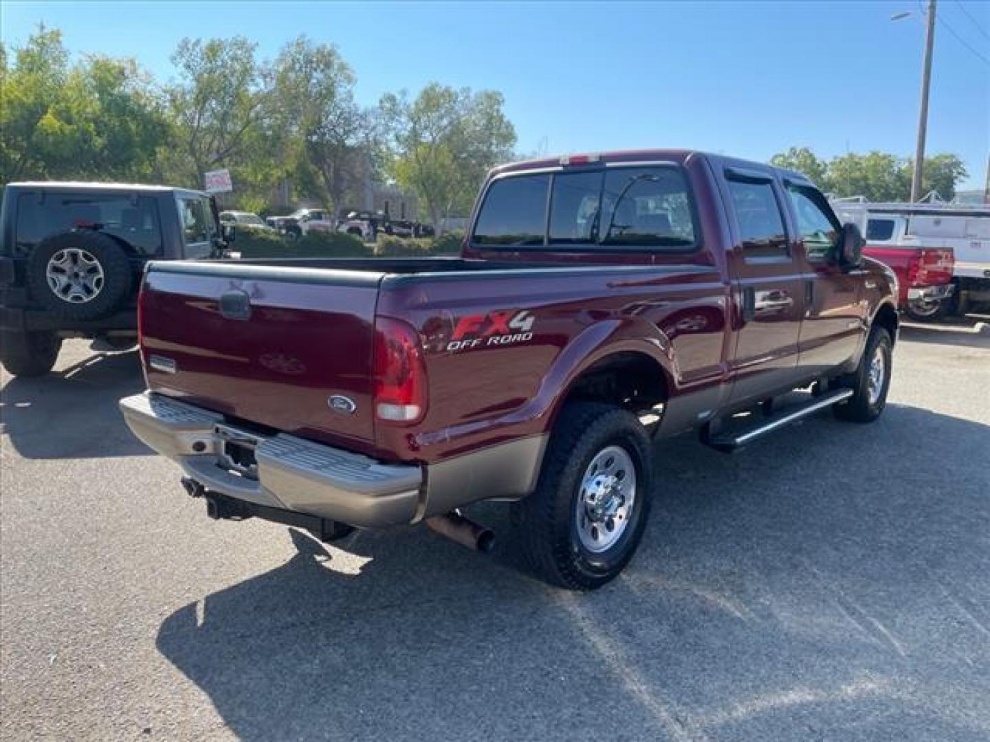 2005 Dark Toreador Red Clearcoat Ford F-250 Super Duty XLT (1FTSW21P05E) with an 6.0L Power Stroke 6.0L Diesel Turbo V8 325hp 560ft. lbs. Direct Injection engine, 6-Speed Manual transmission, located at 800 Riverside Ave, Roseville, CA, 95678, (916) 773-4549, 38.732265, -121.291039 - Photo#3