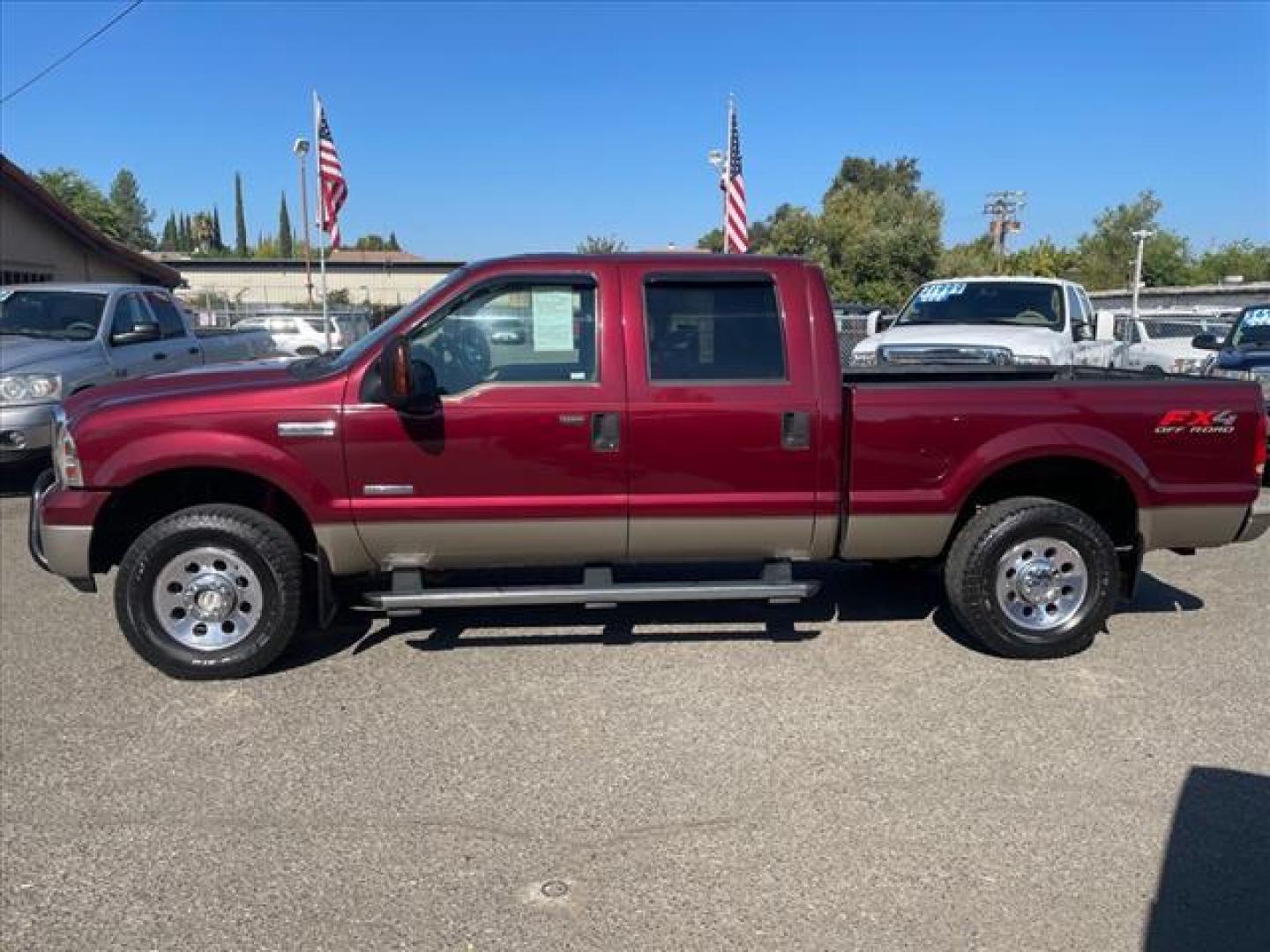 2005 Dark Toreador Red Clearcoat Ford F-250 Super Duty XLT (1FTSW21P05E) with an 6.0L Power Stroke 6.0L Diesel Turbo V8 325hp 560ft. lbs. Direct Injection engine, 6-Speed Manual transmission, located at 800 Riverside Ave, Roseville, CA, 95678, (916) 773-4549, 38.732265, -121.291039 - Photo#4