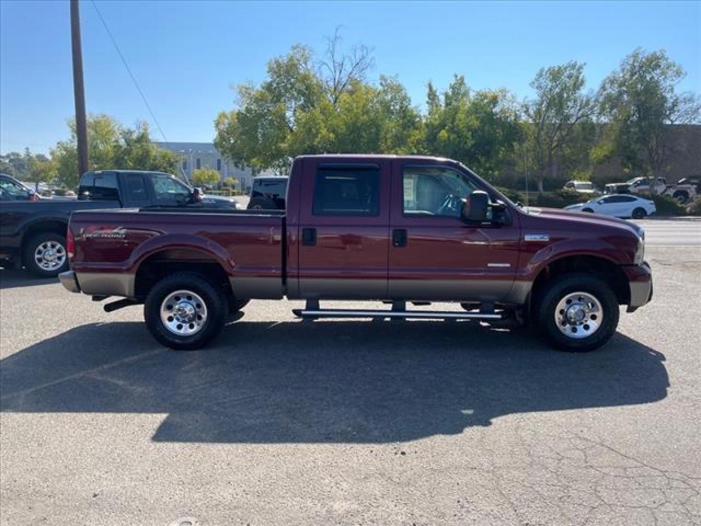 2005 Dark Toreador Red Clearcoat Ford F-250 Super Duty XLT (1FTSW21P05E) with an 6.0L Power Stroke 6.0L Diesel Turbo V8 325hp 560ft. lbs. Direct Injection engine, 6-Speed Manual transmission, located at 800 Riverside Ave, Roseville, CA, 95678, (916) 773-4549, 38.732265, -121.291039 - Photo#5