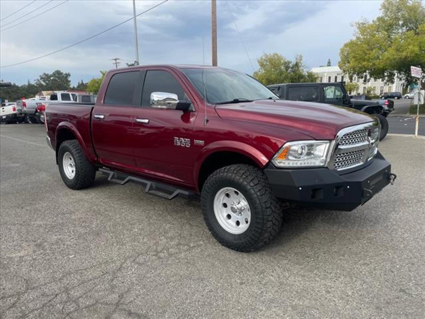 2017 Delmonico Red Pearl Coat RAM 1500 Laramie (1C6RR7NT6HS) with an 5.7L HEMI 5.7L V8 395hp 410ft. lbs. Sequential Multiport Fuel Injection engine, 8-Speed Shiftable Automatic transmission, located at 800 Riverside Ave, Roseville, CA, 95678, (916) 773-4549, 38.732265, -121.291039 - 4X4 CREW CAB LARAMIE 5.7 HEMI V8 CLEAN CARFAX - Photo#1