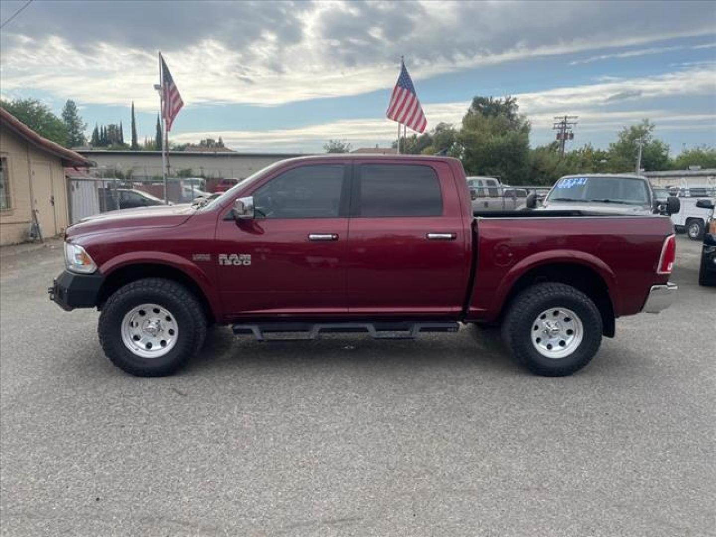 2017 Delmonico Red Pearl Coat RAM 1500 Laramie (1C6RR7NT6HS) with an 5.7L HEMI 5.7L V8 395hp 410ft. lbs. Sequential Multiport Fuel Injection engine, 8-Speed Shiftable Automatic transmission, located at 800 Riverside Ave, Roseville, CA, 95678, (916) 773-4549, 38.732265, -121.291039 - 4X4 CREW CAB LARAMIE 5.7 HEMI V8 CLEAN CARFAX - Photo#4