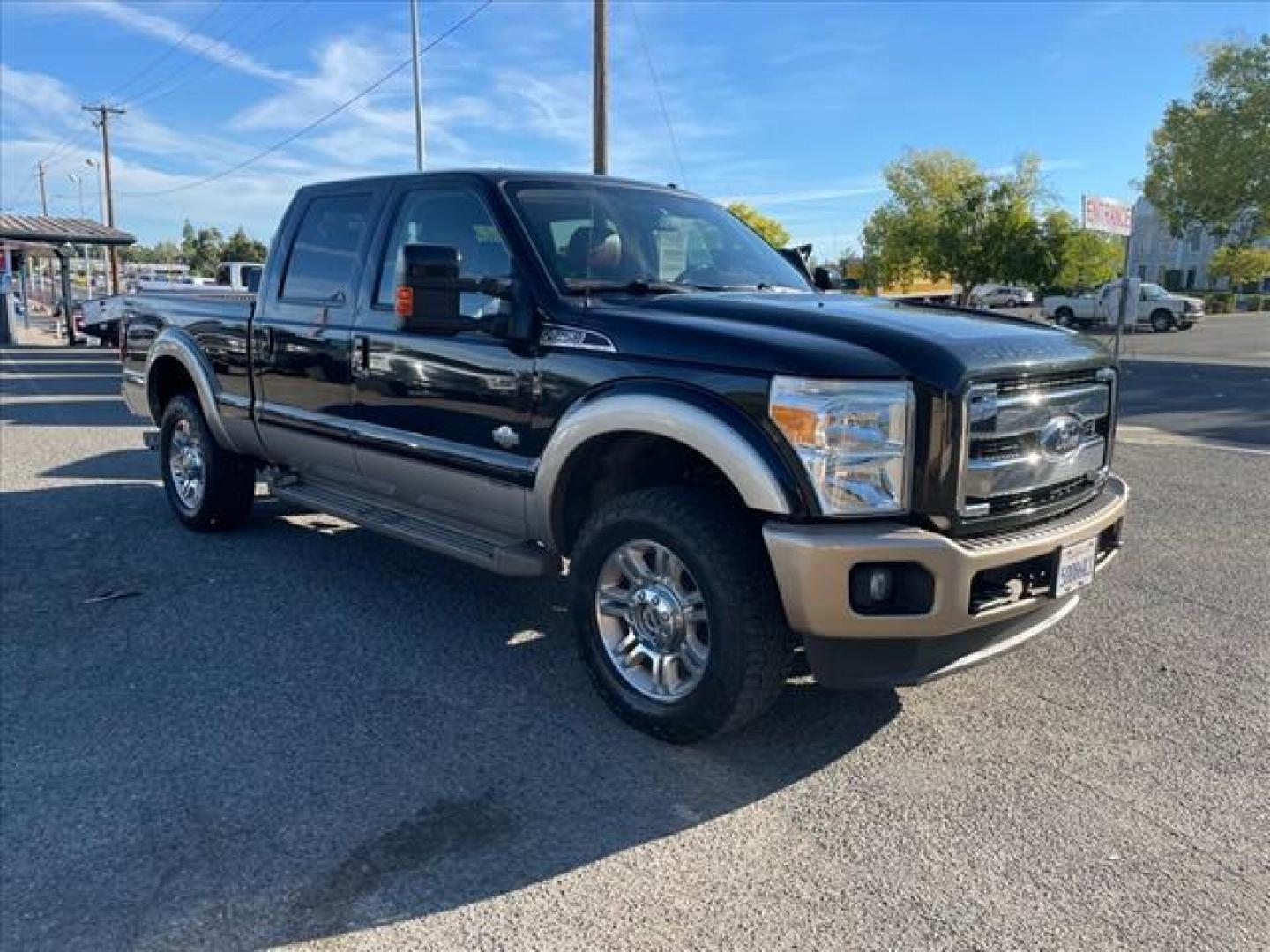 2012 Black/Pale Adobe Metallic Ford F-250 Super Duty King Ranch (1FT7W2BT8CE) with an 6.7L Power Stroke 6.7L Biodiesel Turbo V8 400hp 800ft. lbs. Common Rail Direct Injection engine, 6-Speed Shiftable Automatic transmission, located at 800 Riverside Ave, Roseville, CA, 95678, (916) 773-4549, 38.732265, -121.291039 - DIESEL CREW CAB 4X4 FX4 KING RANCH SERVICE RECORDS ONE OWNER CLEAN CARFAX - Photo#1