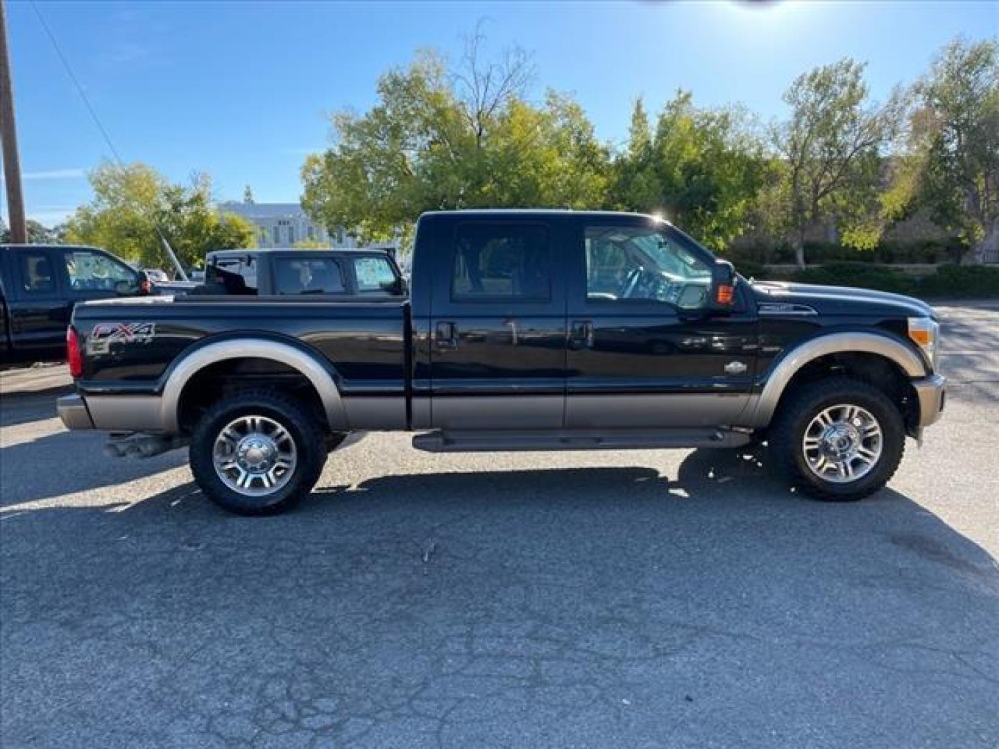 2012 Black/Pale Adobe Metallic Ford F-250 Super Duty King Ranch (1FT7W2BT8CE) with an 6.7L Power Stroke 6.7L Biodiesel Turbo V8 400hp 800ft. lbs. Common Rail Direct Injection engine, 6-Speed Shiftable Automatic transmission, located at 800 Riverside Ave, Roseville, CA, 95678, (916) 773-4549, 38.732265, -121.291039 - DIESEL CREW CAB 4X4 FX4 KING RANCH SERVICE RECORDS ONE OWNER CLEAN CARFAX - Photo#6