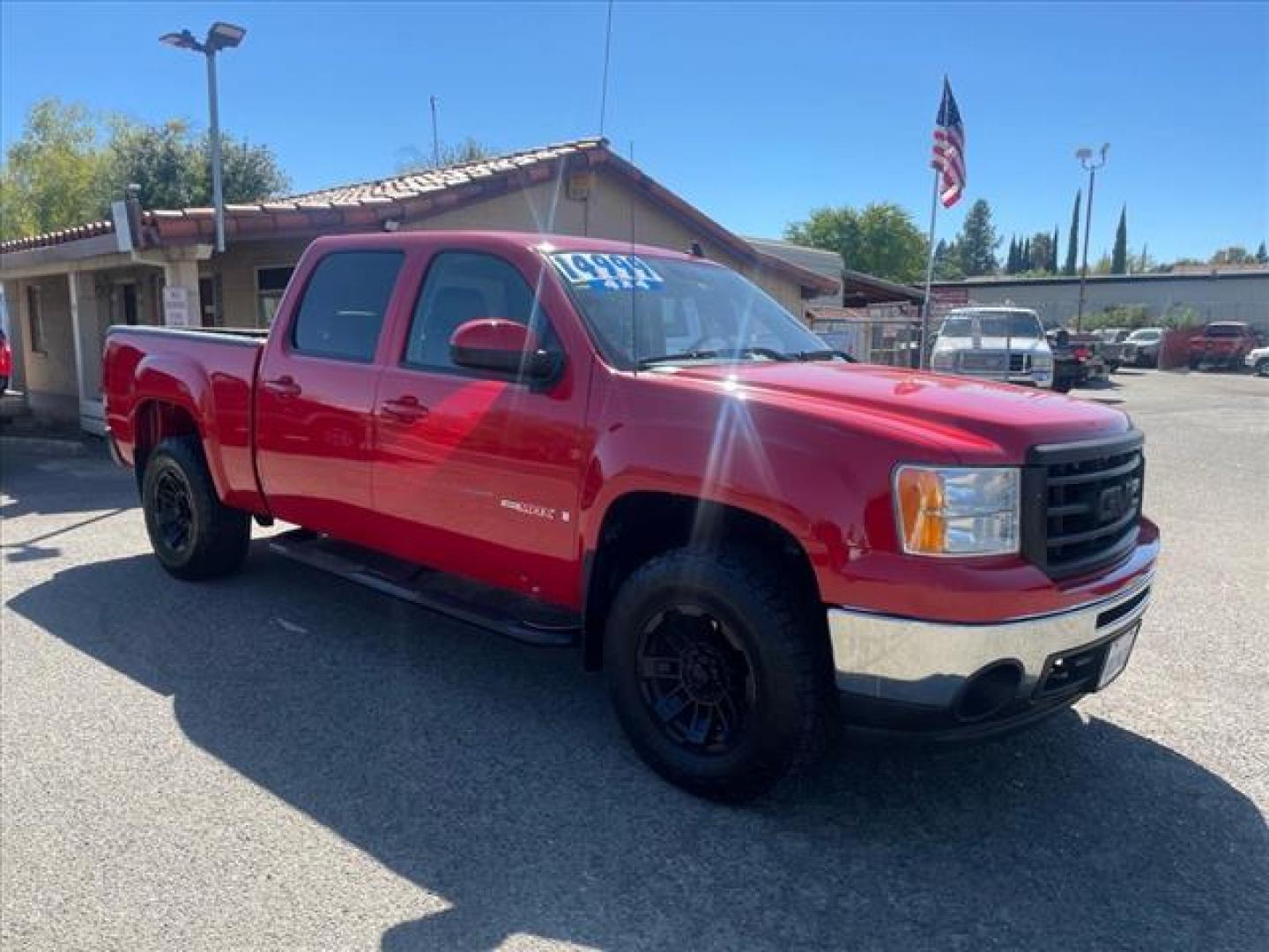 2007 Fire Red GMC Sierra 1500 SLT (2GTFK13Y871) with an 6.0L VortecMAX 6.0L V8 367hp 375ft. lbs. Other engine, 4-Speed Automatic transmission, located at 800 Riverside Ave, Roseville, CA, 95678, (916) 773-4549, 38.732265, -121.291039 - 4X4 CREW CAB SLT VORTEC MAX LOW MILES ONE OWNER SERVICE RECORDS - Photo#1