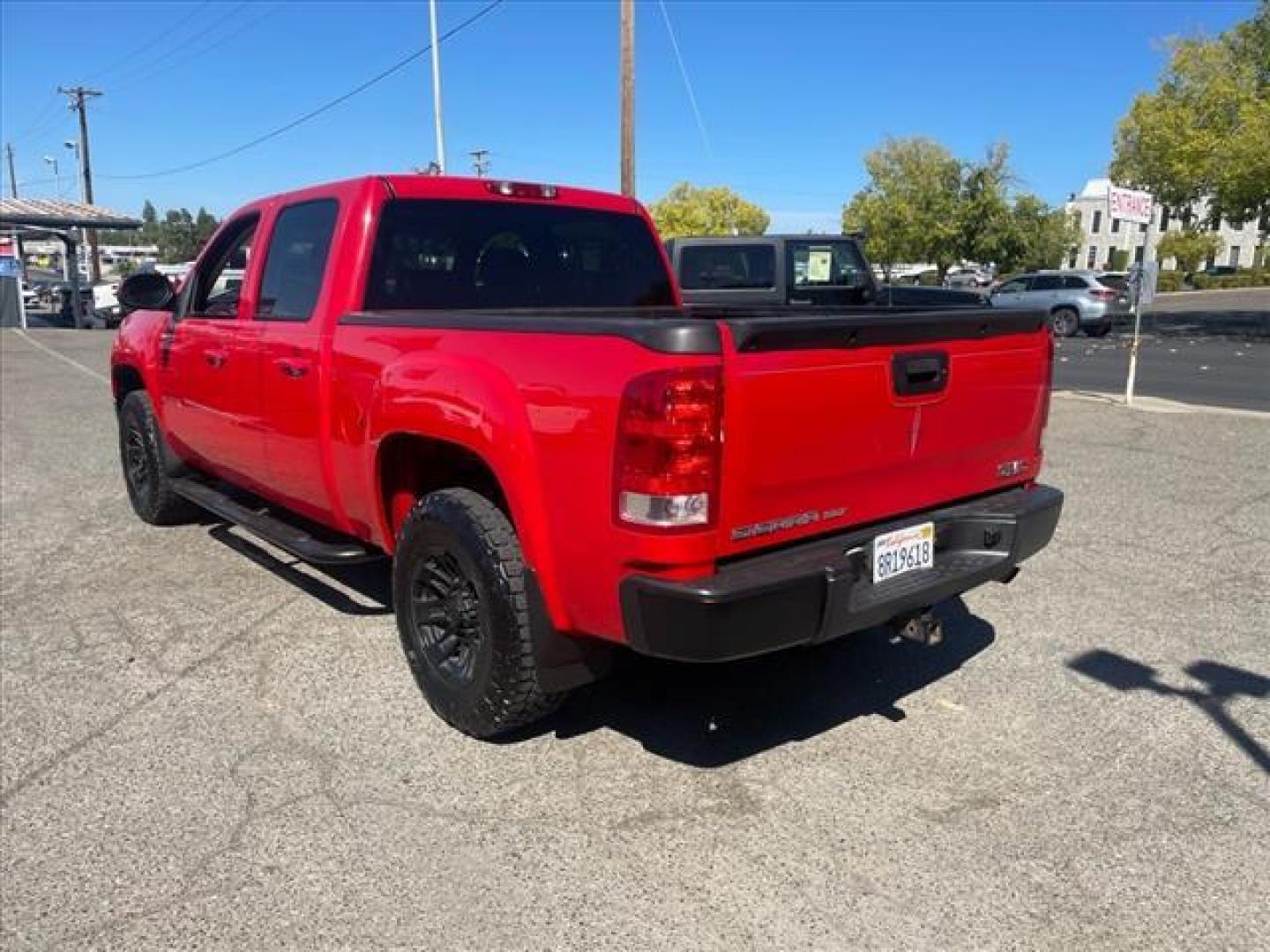 2007 Fire Red GMC Sierra 1500 SLT (2GTFK13Y871) with an 6.0L VortecMAX 6.0L V8 367hp 375ft. lbs. Other engine, 4-Speed Automatic transmission, located at 800 Riverside Ave, Roseville, CA, 95678, (916) 773-4549, 38.732265, -121.291039 - 4X4 CREW CAB SLT VORTEC MAX LOW MILES ONE OWNER SERVICE RECORDS - Photo#3