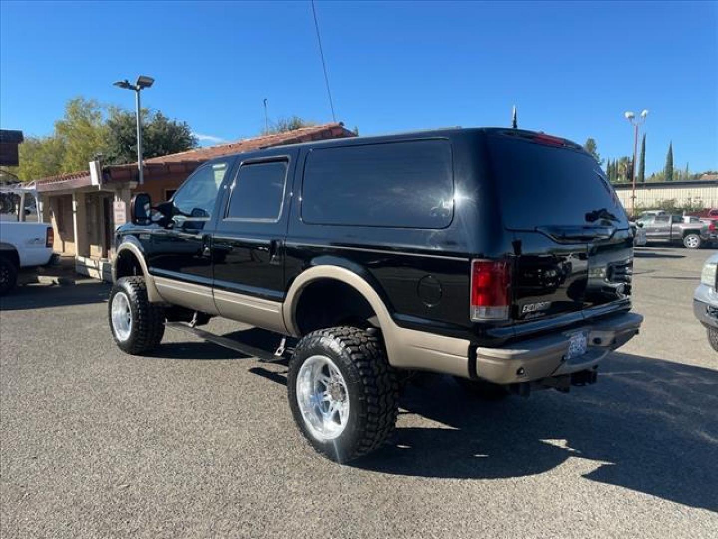 2005 Black Clearcoat Ford Excursion Eddie Bauer (1FMSU45P25E) with an 6.0L Power Stroke 6.0L Diesel Turbo V8 325hp 560ft. lbs. Common Rail Direct Injection engine, 5-Speed Automatic transmission, located at 800 Riverside Ave, Roseville, CA, 95678, (916) 773-4549, 38.732265, -121.291039 - DIESEL 4X4 EDDIE BAUER LIFTED LOW MILES NEW EGR AND OIL COOLER SERVICE RECORDS ONE OWNER - Photo#2