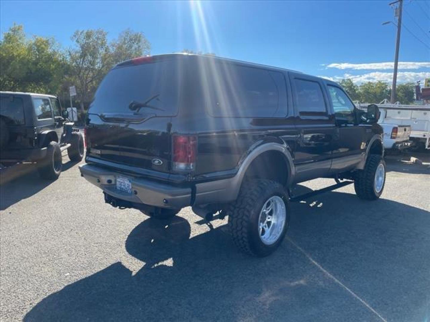 2005 Black Clearcoat Ford Excursion Eddie Bauer (1FMSU45P25E) with an 6.0L Power Stroke 6.0L Diesel Turbo V8 325hp 560ft. lbs. Common Rail Direct Injection engine, 5-Speed Automatic transmission, located at 800 Riverside Ave, Roseville, CA, 95678, (916) 773-4549, 38.732265, -121.291039 - DIESEL 4X4 EDDIE BAUER LIFTED LOW MILES NEW EGR AND OIL COOLER SERVICE RECORDS ONE OWNER - Photo#3