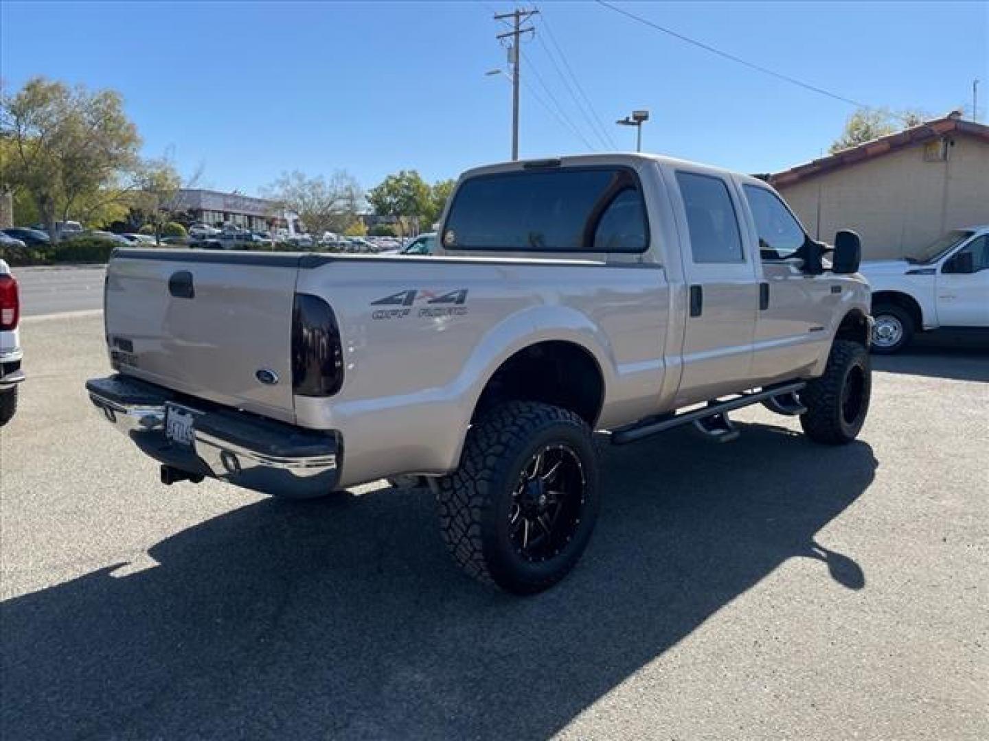 1999 Light Prairie Tan Clearcoat Metallic Ford F-250 Super Duty XLT (1FTNW21F7XE) with an 7.3L Turbocharged Diesel V8 OHV 16V FI Engine Other engine, 4-Speed Automatic transmission, located at 800 Riverside Ave, Roseville, CA, 95678, (916) 773-4549, 38.732265, -121.291039 - Photo#2