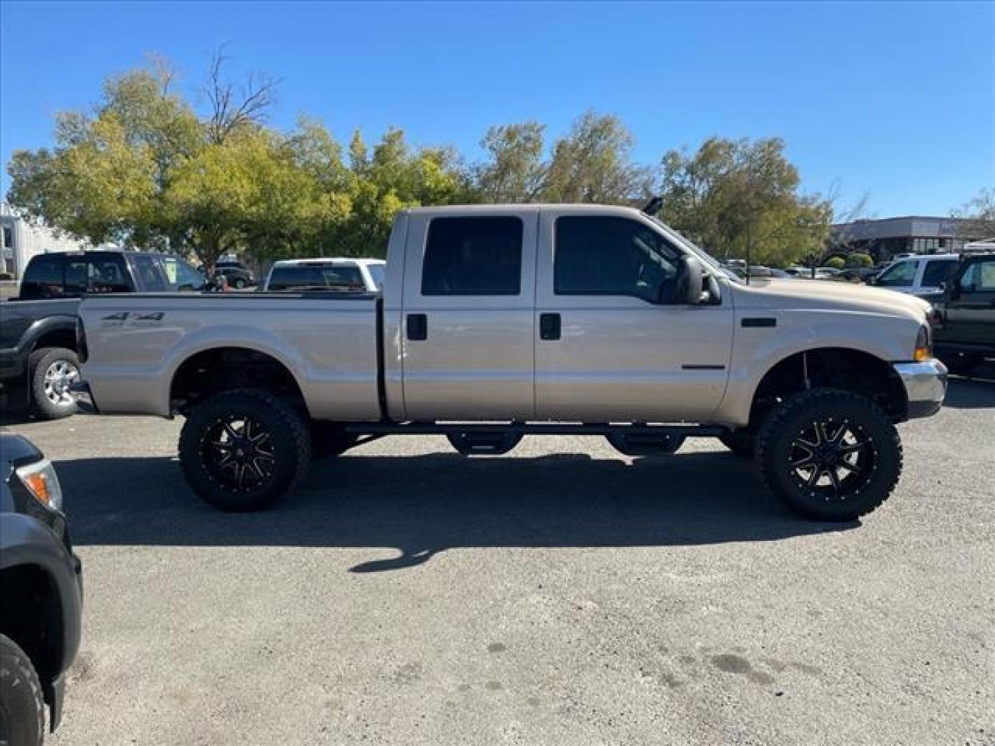 1999 Light Prairie Tan Clearcoat Metallic Ford F-250 Super Duty XLT (1FTNW21F7XE) with an 7.3L Turbocharged Diesel V8 OHV 16V FI Engine Other engine, 4-Speed Automatic transmission, located at 800 Riverside Ave, Roseville, CA, 95678, (916) 773-4549, 38.732265, -121.291039 - Photo#4