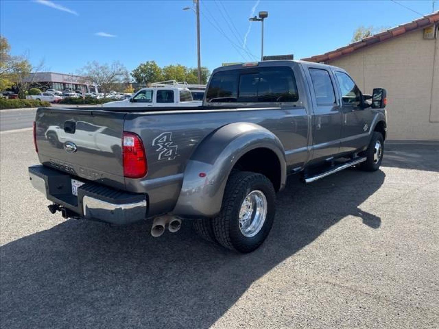 2011 Sterling Grey Metallic Ford F-350 Super Duty Lariat (1FT8W3DT1BE) with an 6.7L Power Stroke 6.7L Biodiesel Turbo V8 400hp 800ft. lbs. Common Rail Direct Injection engine, 6-Speed Shiftable Automatic transmission, located at 800 Riverside Ave, Roseville, CA, 95678, (916) 773-4549, 38.732265, -121.291039 - DIESEL CREW CAB DUALLY 4X4 LARIAT MOON ROOF CLEAN CARFAX - Photo#3