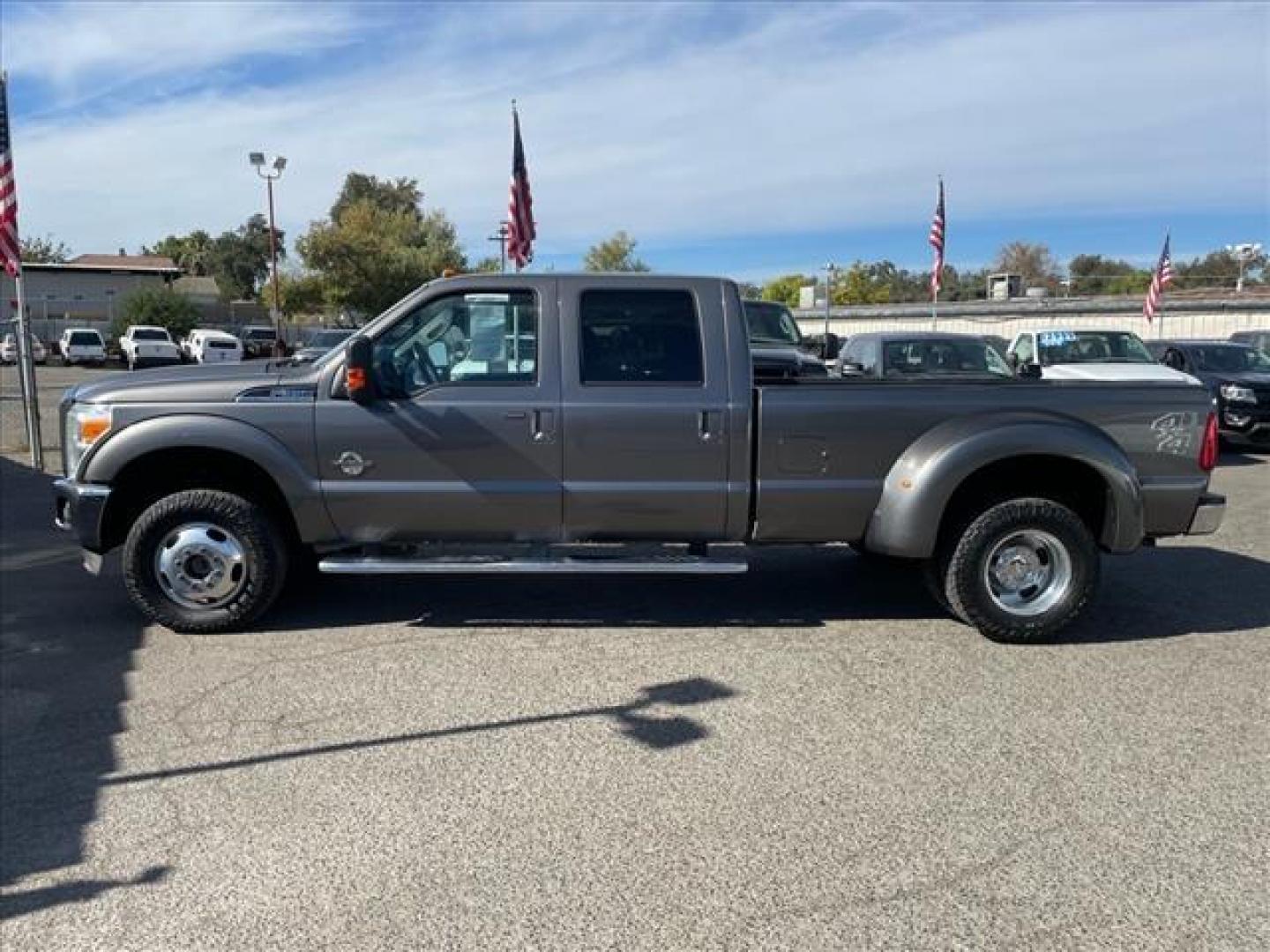 2011 Sterling Grey Metallic Ford F-350 Super Duty Lariat (1FT8W3DT1BE) with an 6.7L Power Stroke 6.7L Biodiesel Turbo V8 400hp 800ft. lbs. Common Rail Direct Injection engine, 6-Speed Shiftable Automatic transmission, located at 800 Riverside Ave, Roseville, CA, 95678, (916) 773-4549, 38.732265, -121.291039 - DIESEL CREW CAB DUALLY 4X4 LARIAT MOON ROOF CLEAN CARFAX - Photo#4