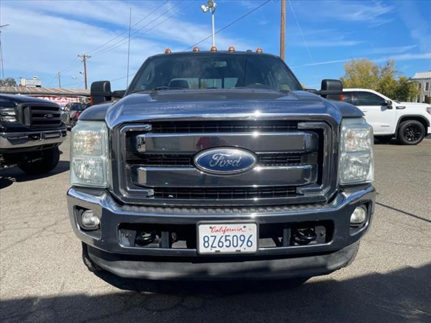 2011 Sterling Grey Metallic Ford F-350 Super Duty Lariat (1FT8W3DT1BE) with an 6.7L Power Stroke 6.7L Biodiesel Turbo V8 400hp 800ft. lbs. Common Rail Direct Injection engine, 6-Speed Shiftable Automatic transmission, located at 800 Riverside Ave, Roseville, CA, 95678, (916) 773-4549, 38.732265, -121.291039 - DIESEL CREW CAB DUALLY 4X4 LARIAT MOON ROOF CLEAN CARFAX - Photo#7