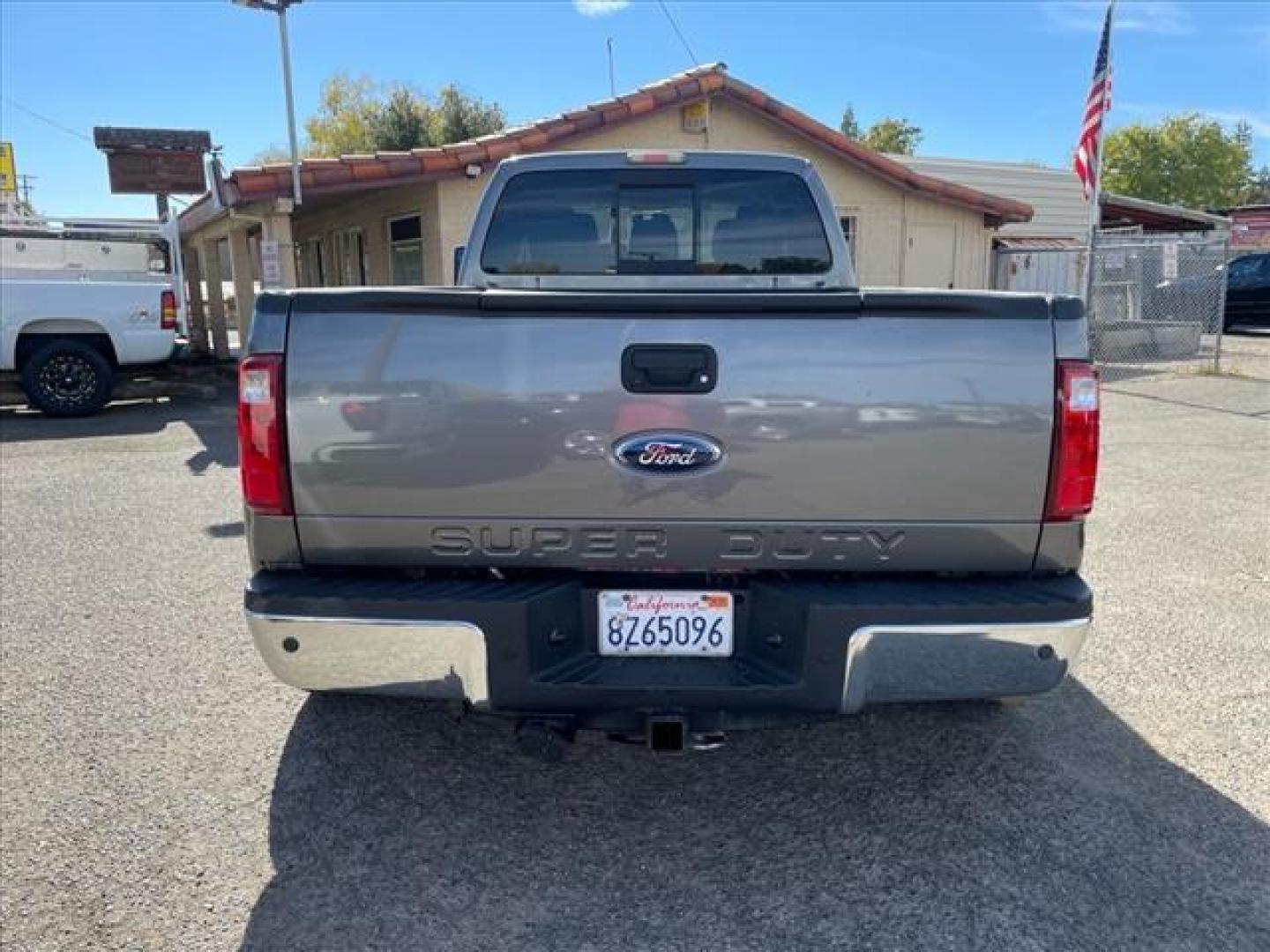 2011 Sterling Grey Metallic Ford F-350 Super Duty Lariat (1FT8W3DT1BE) with an 6.7L Power Stroke 6.7L Biodiesel Turbo V8 400hp 800ft. lbs. Common Rail Direct Injection engine, 6-Speed Shiftable Automatic transmission, located at 800 Riverside Ave, Roseville, CA, 95678, (916) 773-4549, 38.732265, -121.291039 - DIESEL CREW CAB DUALLY 4X4 LARIAT MOON ROOF CLEAN CARFAX - Photo#8