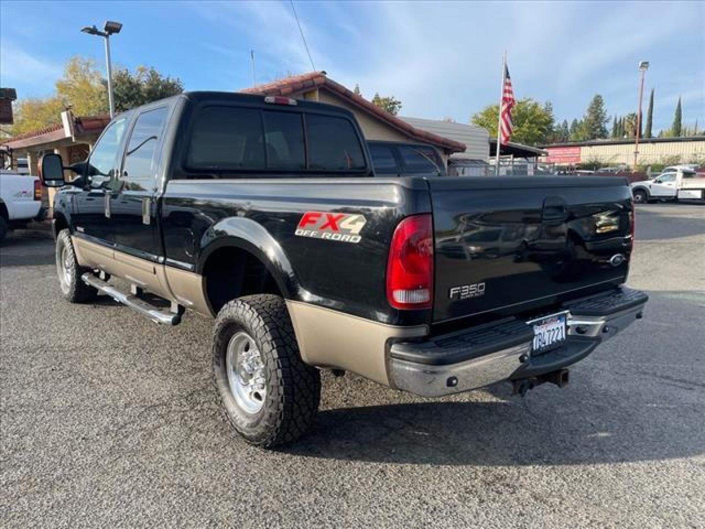 2003 Black/Arizona Beige Metallic Ford F-350 Super Duty Lariat (1FTSW31P13E) with an Power Stroke 6.0L Diesel Turbo V8 325hp 560ft. lbs. Other engine, 5-Speed Automatic transmission, located at 800 Riverside Ave, Roseville, CA, 95678, (916) 773-4549, 38.732265, -121.291039 - DIESEL CREW CAB 4X4 FX4 LARIAT OIL COOLER REPLACED SERVICE RECORDS ON CLEAN CARFAX - Photo#2