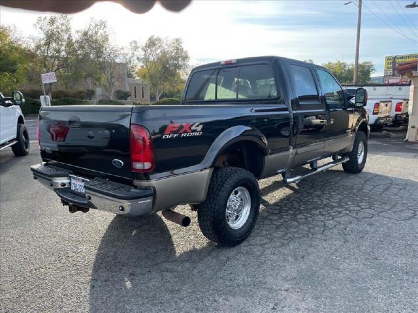 2003 Black/Arizona Beige Metallic Ford F-350 Super Duty Lariat (1FTSW31P13E) with an Power Stroke 6.0L Diesel Turbo V8 325hp 560ft. lbs. Other engine, 5-Speed Automatic transmission, located at 800 Riverside Ave, Roseville, CA, 95678, (916) 773-4549, 38.732265, -121.291039 - DIESEL CREW CAB 4X4 FX4 LARIAT OIL COOLER REPLACED SERVICE RECORDS ON CLEAN CARFAX - Photo#3