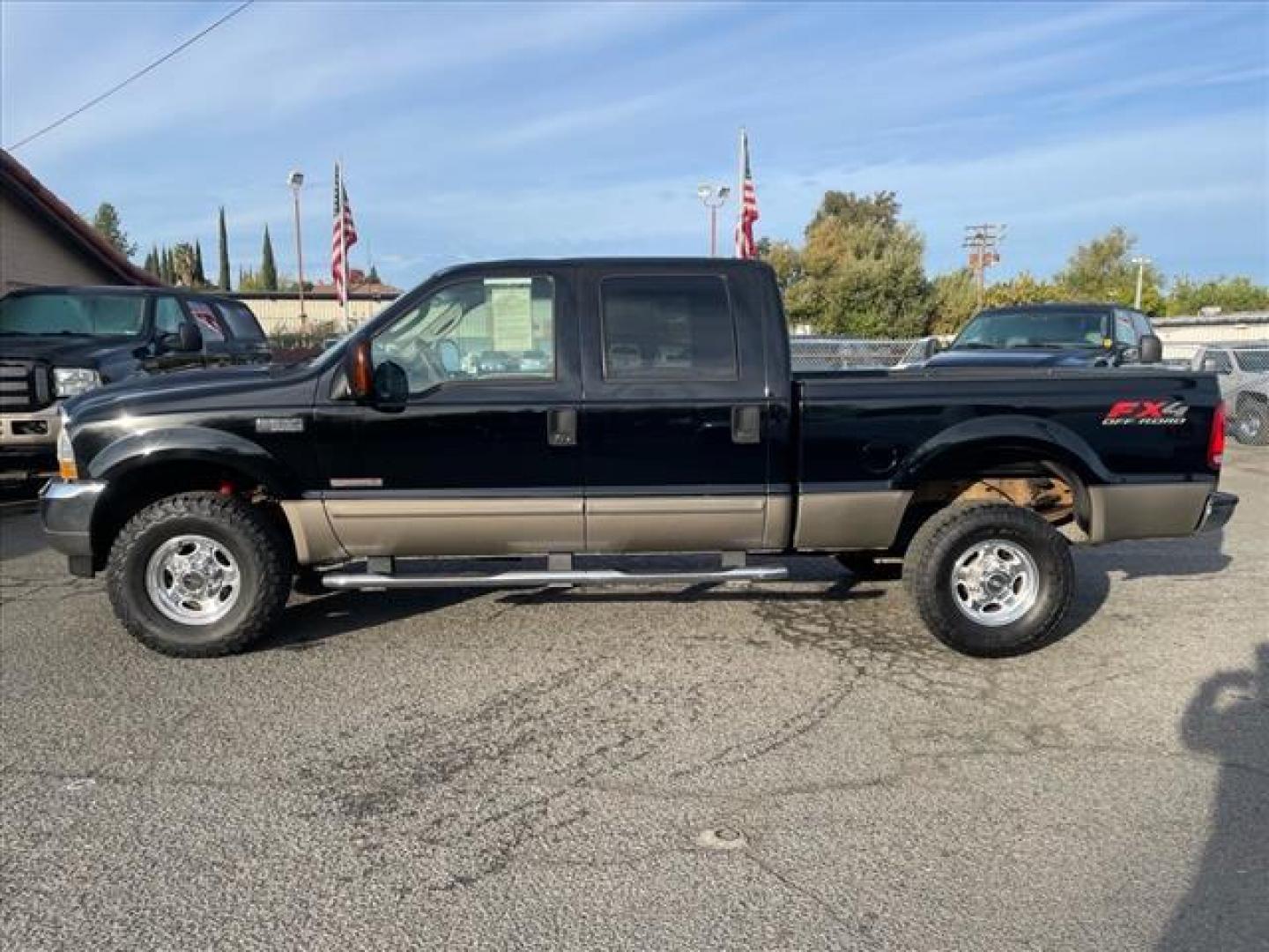 2003 Black/Arizona Beige Metallic Ford F-350 Super Duty Lariat (1FTSW31P13E) with an Power Stroke 6.0L Diesel Turbo V8 325hp 560ft. lbs. Other engine, 5-Speed Automatic transmission, located at 800 Riverside Ave, Roseville, CA, 95678, (916) 773-4549, 38.732265, -121.291039 - DIESEL CREW CAB 4X4 FX4 LARIAT OIL COOLER REPLACED SERVICE RECORDS ON CLEAN CARFAX - Photo#5