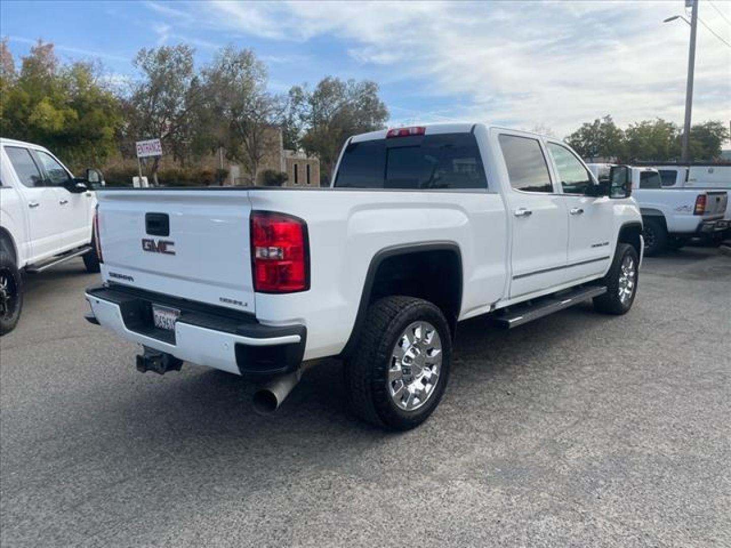 2016 Summit White GMC Sierra 2500HD Denali (1GT12UE86GF) with an 6.6L Duramax 6.6L Diesel Turbo V8 397hp 765ft. lbs. Common Rail Direct Injection engine, Allison 1000 6-Speed Shiftable Automatic transmission, located at 800 Riverside Ave, Roseville, CA, 95678, (916) 773-4549, 38.732265, -121.291039 - Photo#4