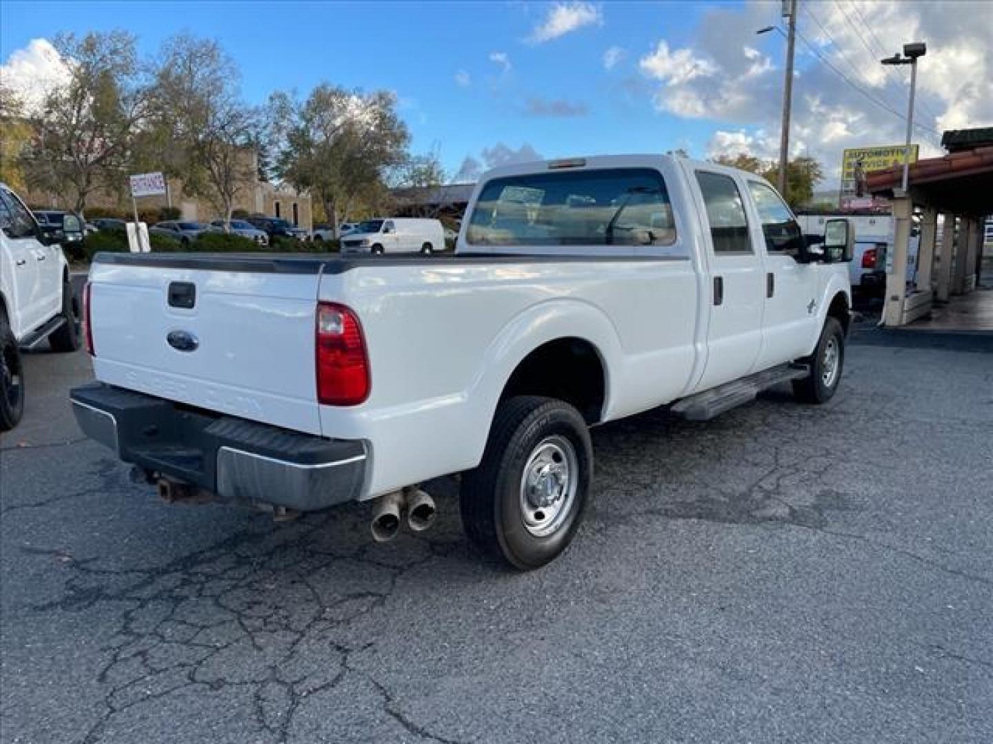 2013 Oxford White Ford F-350 Super Duty XL (1FT8W3BT4DE) with an 6.7L Power Stroke 6.7L Biodiesel Turbo V8 400hp 800ft. lbs. Common Rail Direct Injection engine, 6-Speed Shiftable Automatic transmission, located at 800 Riverside Ave, Roseville, CA, 95678, (916) 773-4549, 38.732265, -121.291039 - Photo#4