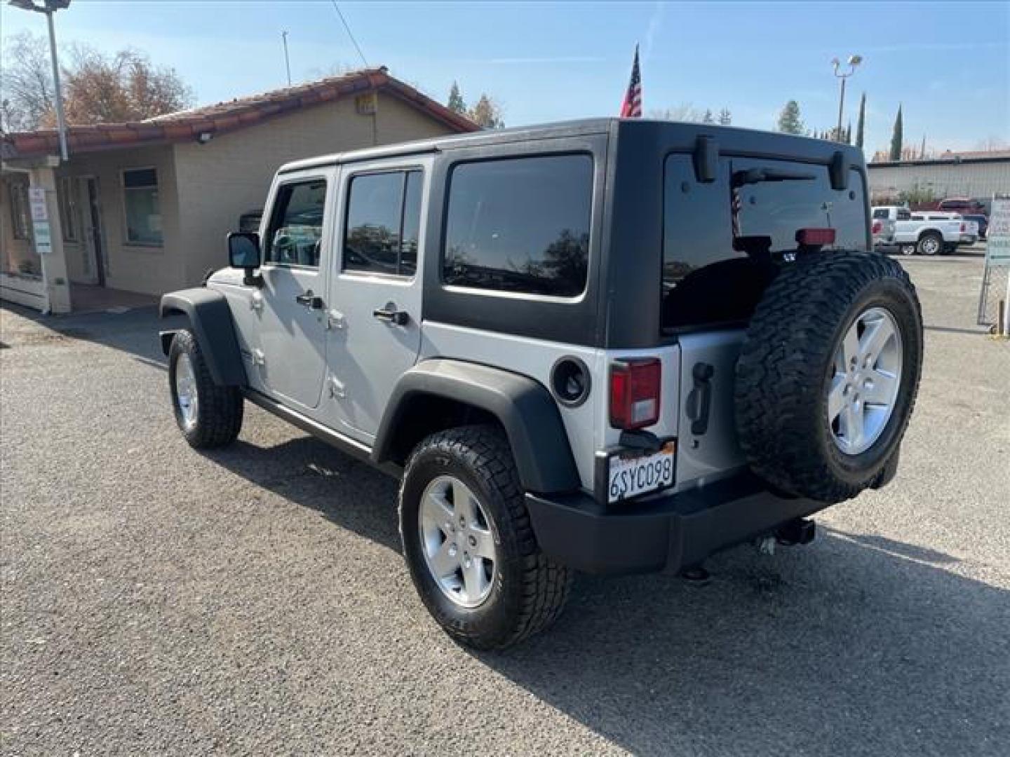 2011 Bright Silver Metallic Clear Coat Jeep Wrangler Unlimited Rubicon (1J4BA6H18BL) with an 3.8L 3.8L V6 202hp 237ft. lbs. Sequential Multiport Fuel Injection engine, 4-Speed Automatic transmission, located at 800 Riverside Ave, Roseville, CA, 95678, (916) 773-4549, 38.732265, -121.291039 - Photo#3