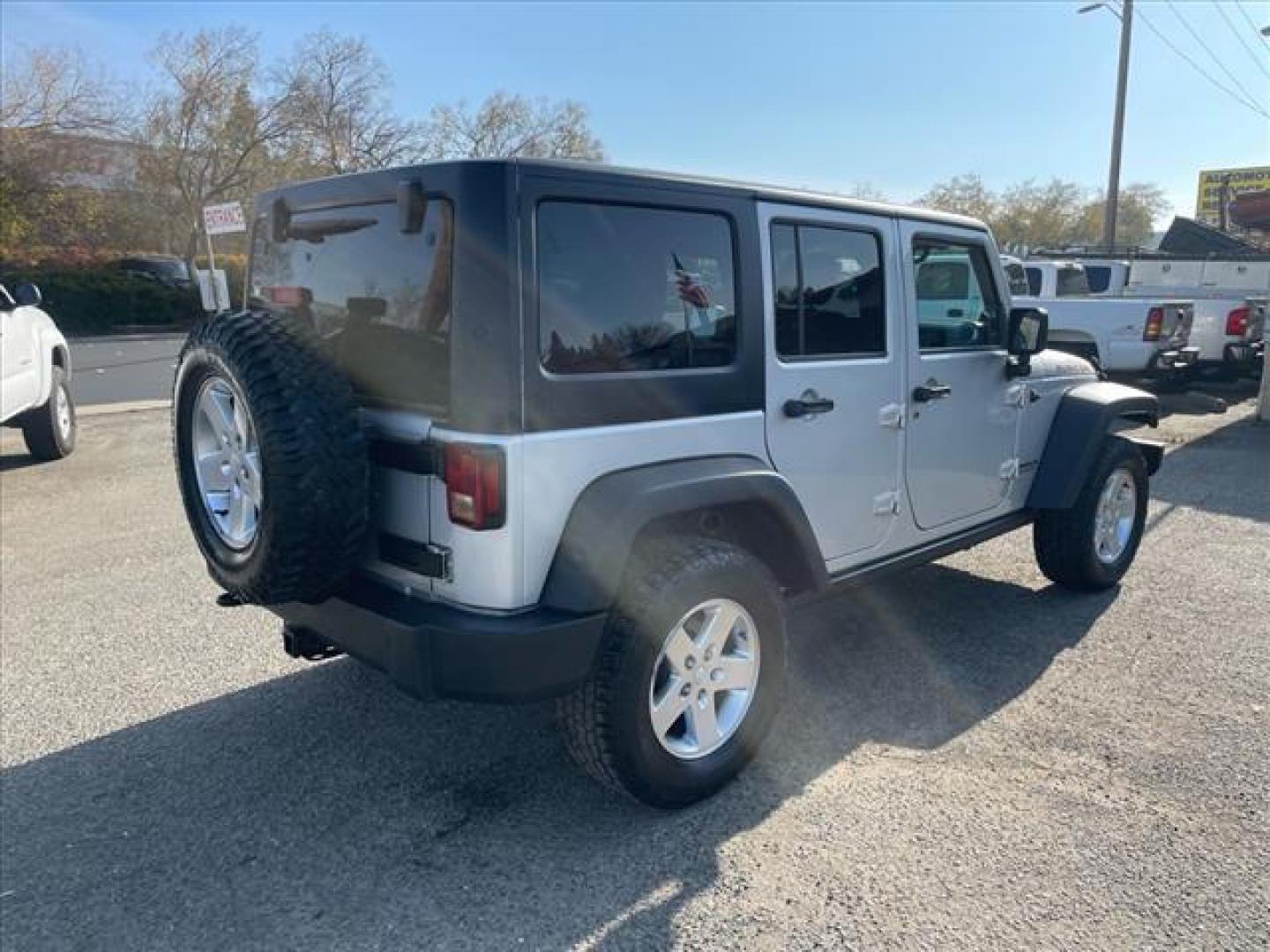 2011 Bright Silver Metallic Clear Coat Jeep Wrangler Unlimited Rubicon (1J4BA6H18BL) with an 3.8L 3.8L V6 202hp 237ft. lbs. Sequential Multiport Fuel Injection engine, 4-Speed Automatic transmission, located at 800 Riverside Ave, Roseville, CA, 95678, (916) 773-4549, 38.732265, -121.291039 - Photo#4