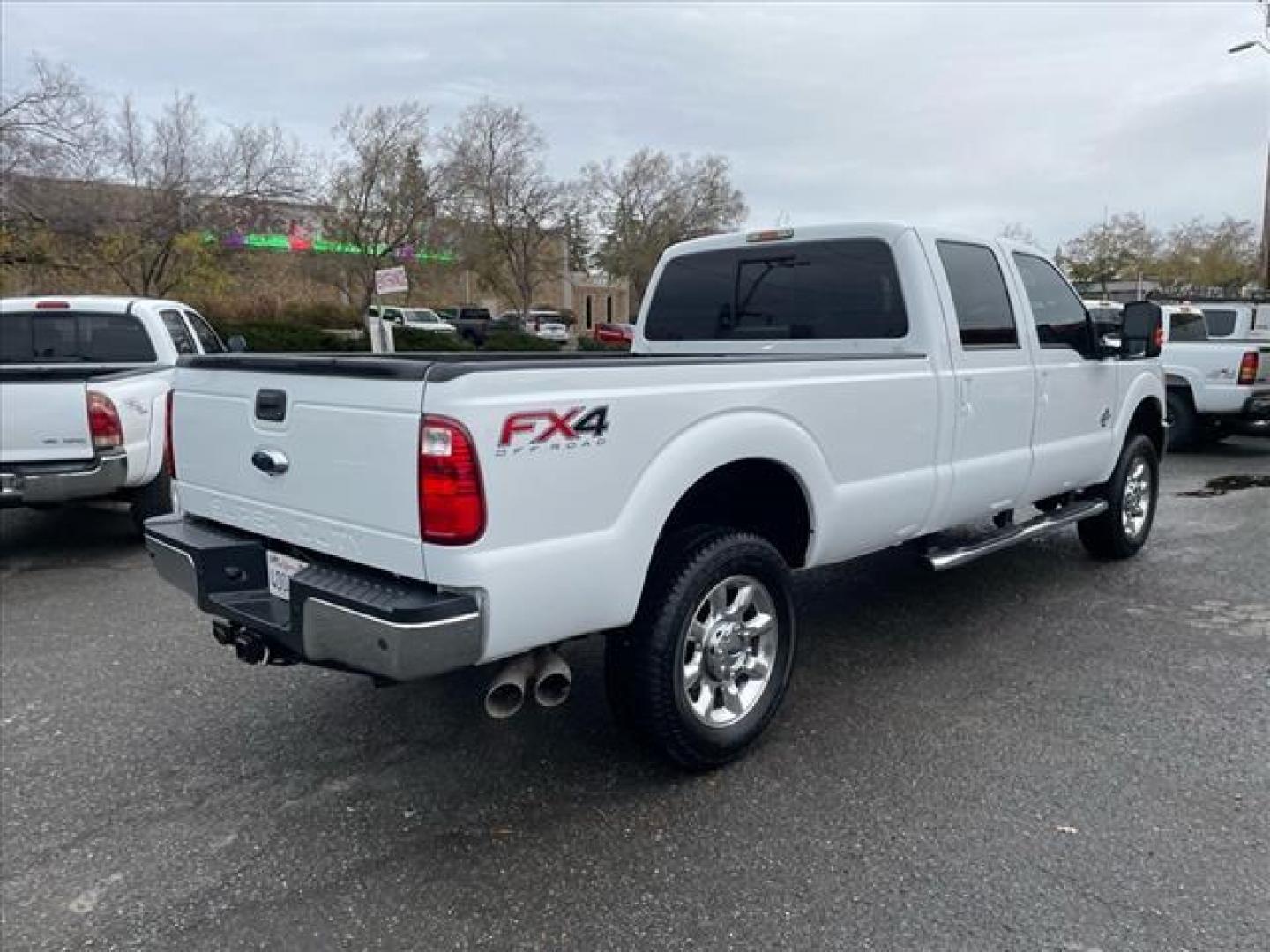 2014 Oxford White Ford F-350 Super Duty Lariat (1FT8W3BT3EE) with an 6.7L Power Stroke 6.7L Biodiesel Turbo V8 400hp 800ft. lbs. Common Rail Direct Injection engine, 6-Speed Shiftable Automatic transmission, located at 800 Riverside Ave, Roseville, CA, 95678, (916) 773-4549, 38.732265, -121.291039 - Photo#4