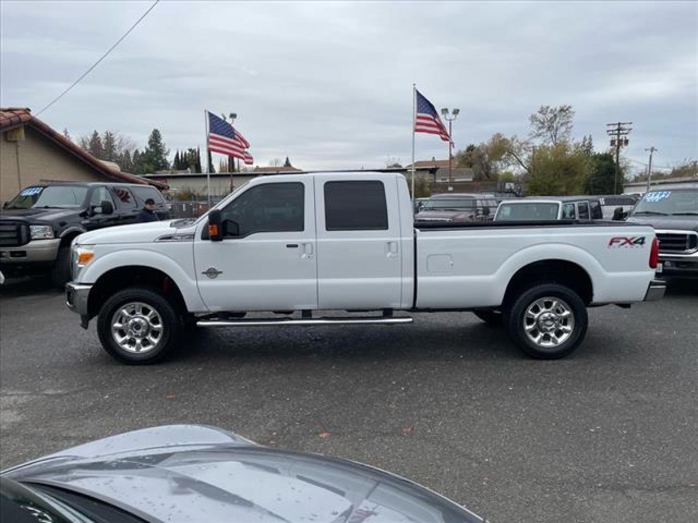 2014 Oxford White Ford F-350 Super Duty Lariat (1FT8W3BT3EE) with an 6.7L Power Stroke 6.7L Biodiesel Turbo V8 400hp 800ft. lbs. Common Rail Direct Injection engine, 6-Speed Shiftable Automatic transmission, located at 800 Riverside Ave, Roseville, CA, 95678, (916) 773-4549, 38.732265, -121.291039 - Photo#5