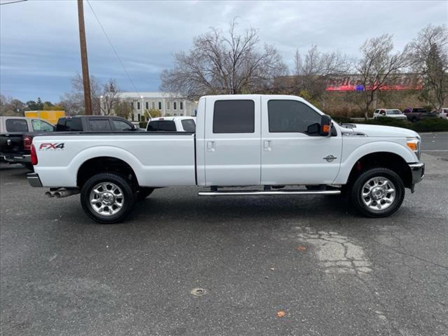 2014 Oxford White Ford F-350 Super Duty Lariat (1FT8W3BT3EE) with an 6.7L Power Stroke 6.7L Biodiesel Turbo V8 400hp 800ft. lbs. Common Rail Direct Injection engine, 6-Speed Shiftable Automatic transmission, located at 800 Riverside Ave, Roseville, CA, 95678, (916) 773-4549, 38.732265, -121.291039 - Photo#6