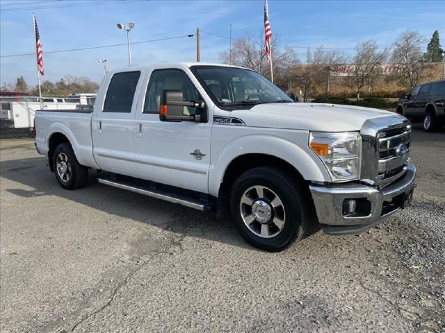 2011 Oxford White Ford F-250 Super Duty Lariat (1FT7W2AT2BE) with an 6.7L Power Stroke 6.7L Biodiesel Turbo V8 400hp 800ft. lbs. Common Rail Direct Injection engine, 6-Speed Shiftable Automatic transmission, located at 800 Riverside Ave, Roseville, CA, 95678, (916) 773-4549, 38.732265, -121.291039 - DIESEL CREW CAB LARIAT LOW MILES - Photo#1