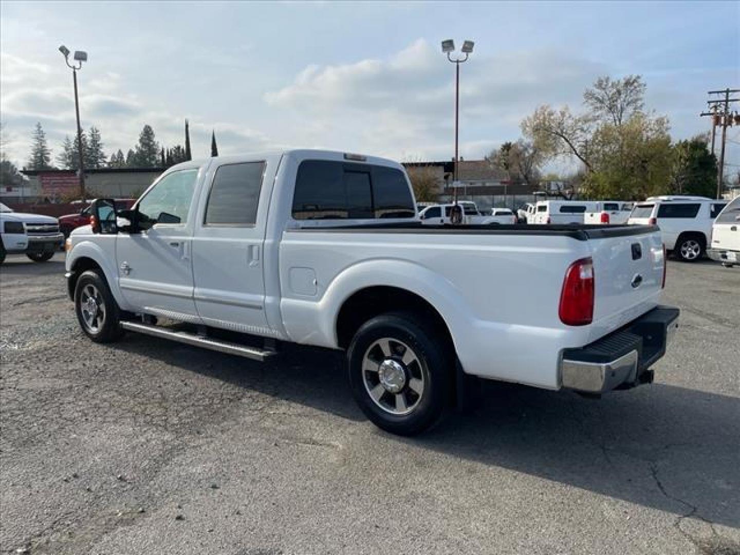 2011 Oxford White Ford F-250 Super Duty Lariat (1FT7W2AT2BE) with an 6.7L Power Stroke 6.7L Biodiesel Turbo V8 400hp 800ft. lbs. Common Rail Direct Injection engine, 6-Speed Shiftable Automatic transmission, located at 800 Riverside Ave, Roseville, CA, 95678, (916) 773-4549, 38.732265, -121.291039 - DIESEL CREW CAB LARIAT LOW MILES - Photo#2